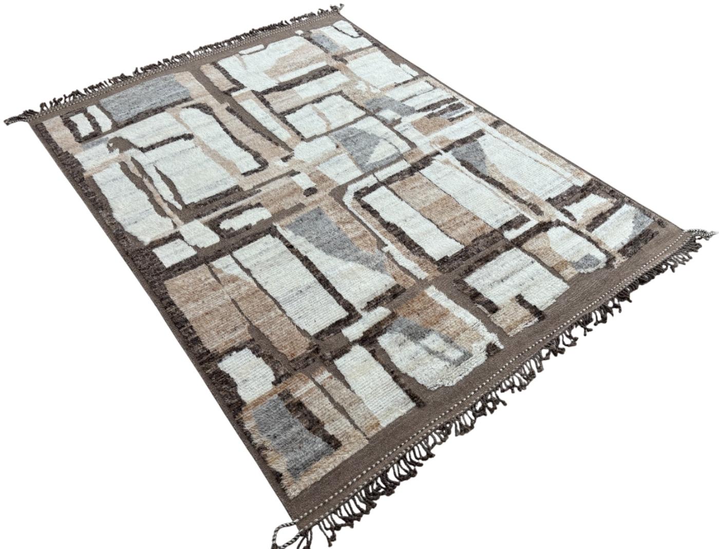 Elevate your living space with the exquisite charm of this new modern hand-knotted Moroccan Berber Beni Ourain design rug, crafted with precision and care from 100% wool. Combining the allure of Moroccan style with contemporary sensibilities, this