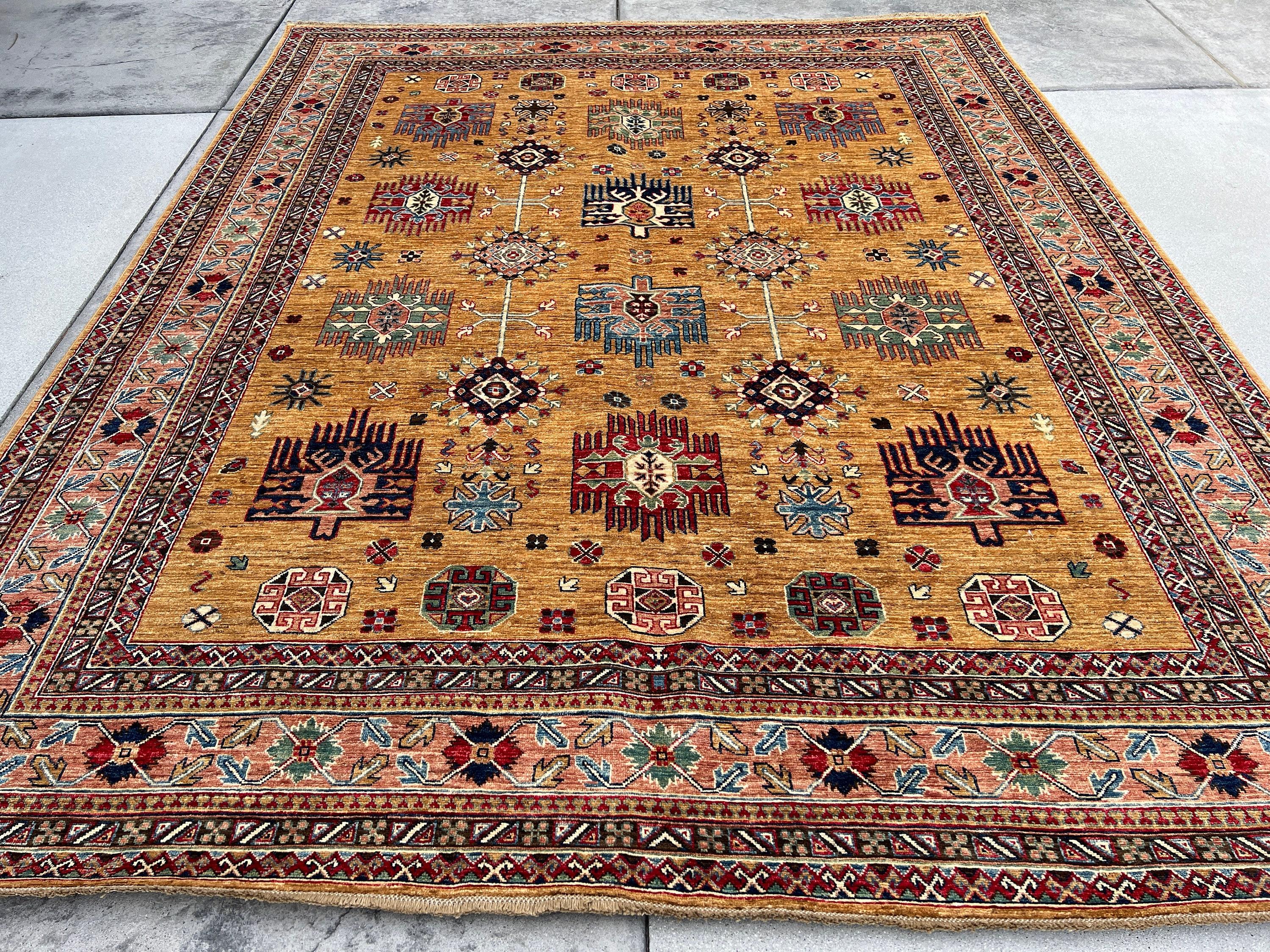 This rug was made with 100% premium, Afghan-sourced Ghazni wool with a cotton foundation. The rich colors are dipped in natural dyes to create an heirloom finish that does not bleed and is meant to last for generations. Sourced through fair trade