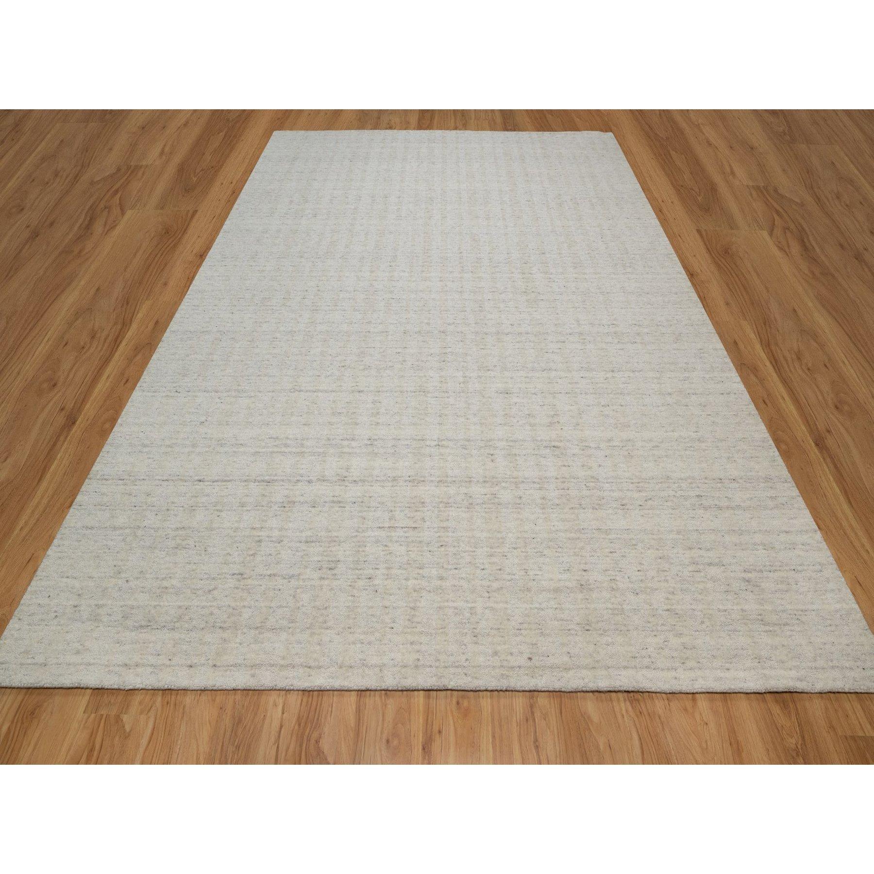 Papyrus White, Undyed Natural Wool, Vertical Stripes Design with Salt and Pepper Effect, Hand Loomed, Oriental Rug
Primary materials: Wool
Latex: No Pile 
height: 0.25 Inches
Style: Contemporary
Primary color: Ivory
Secondary colors: None
Pattern: