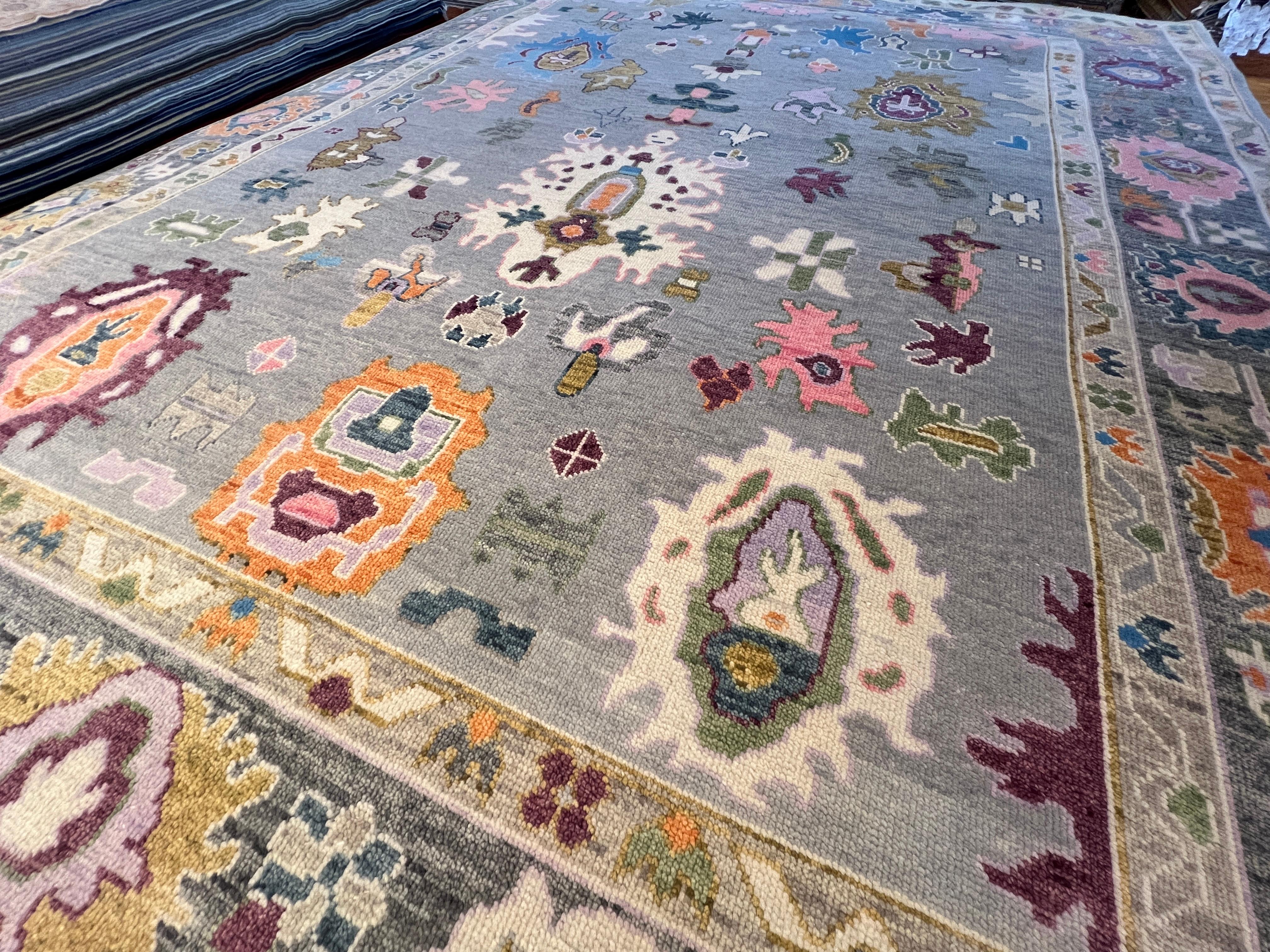 Elevate your space with our 9'x12' Persian design grey ivory all wool hand-knotted rug made in India. Featuring a great transitional design, this rug adds style and luxurious comfort to any room. Made with high-quality wool, it's easy to clean,