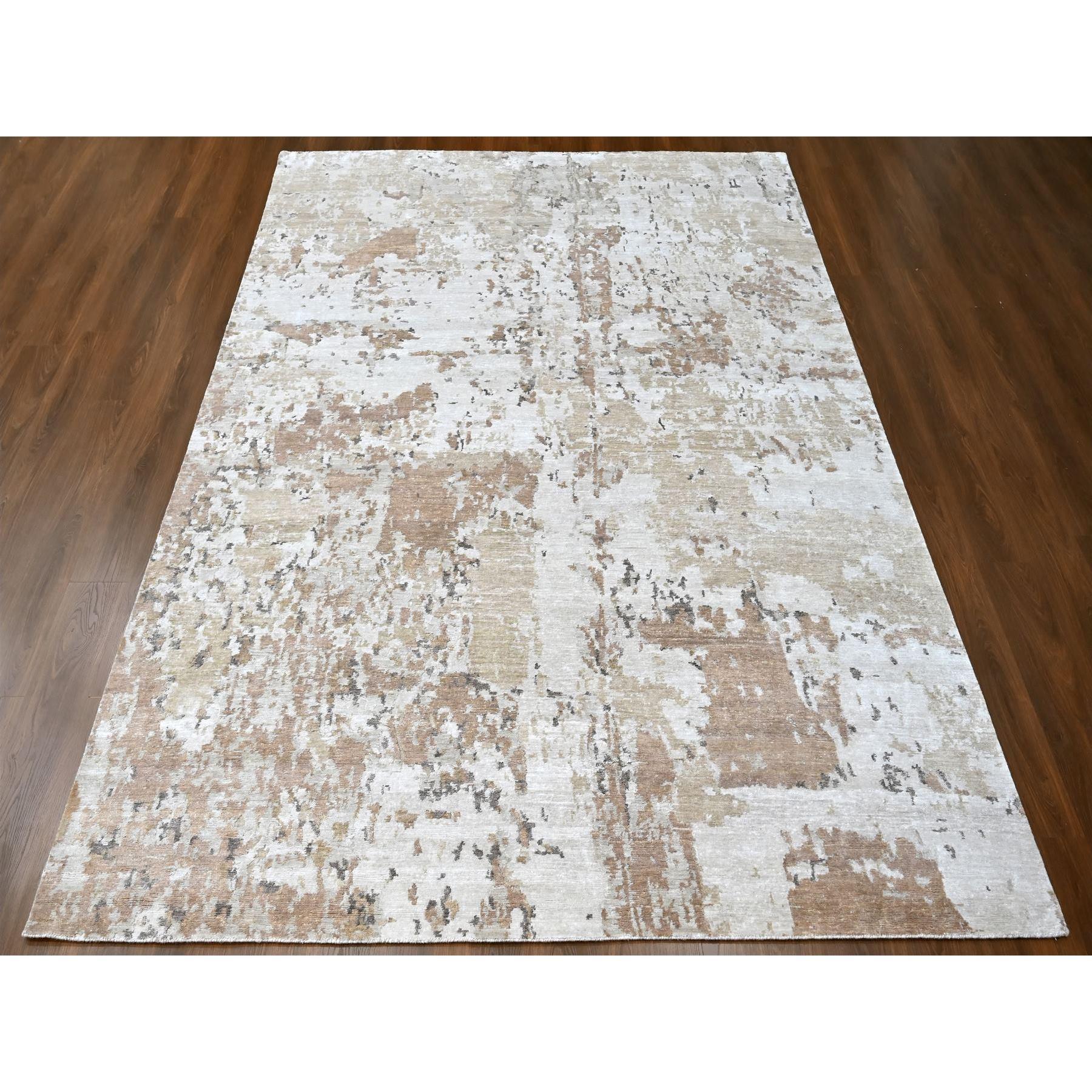 Marrón castor y tonos tierra, diseño abstracto con tejido nepalí, seda brillante de origen vegetal, anudada a mano, alfombra oriental
Materiales primarios: Seda
Látex: Sin pelo 
altura: 0,25 Pulgadas
Estilo: Contemporáneo
Color principal: