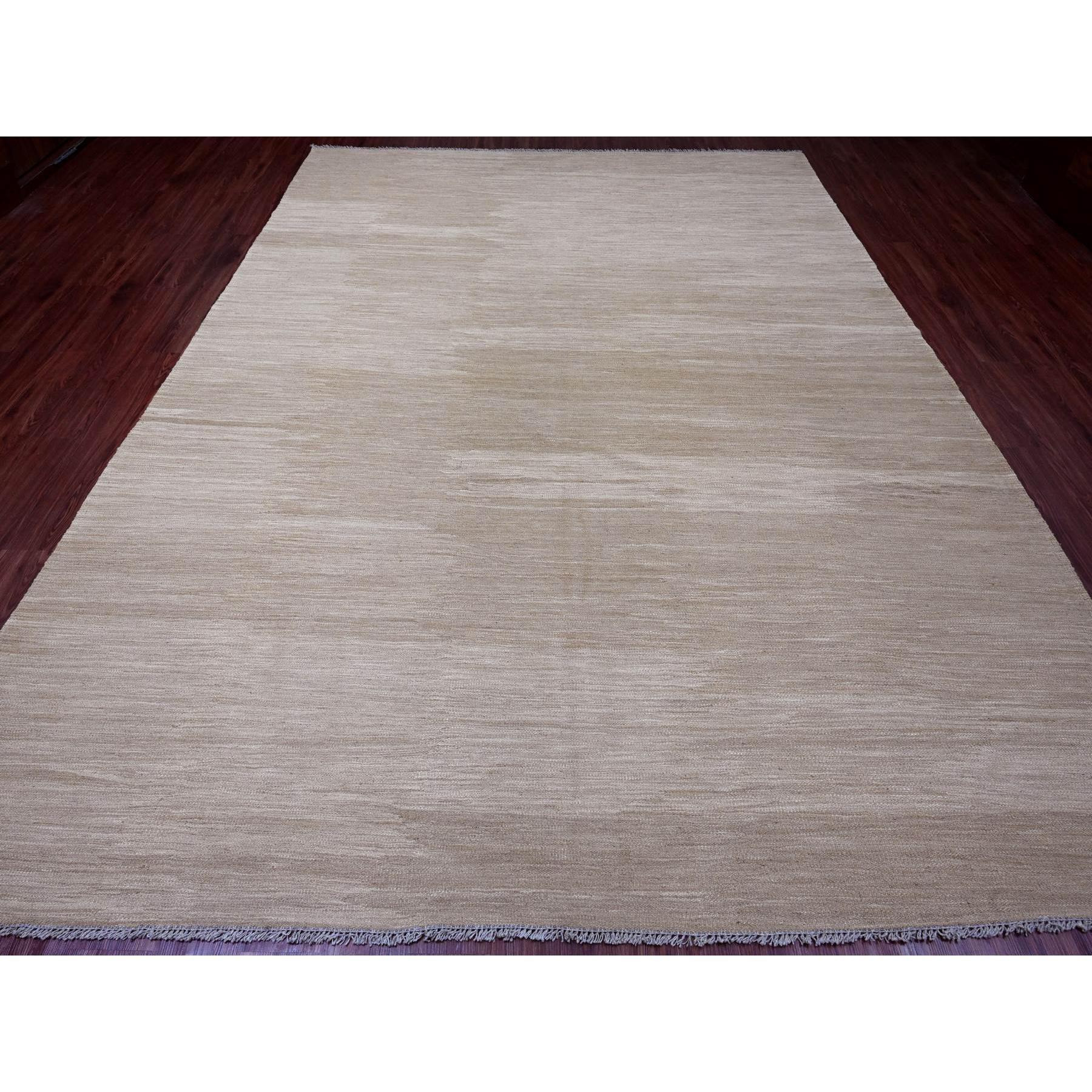 Beaver Brown, Solid Design, Mixed Wool, Vegetable Dyes, Hand Woven, Kilim, Flat Weave, Oriental Rug
Primary materials: Wool
Latex: No Pile 
height: 0.25 Inches
Style: Contemporary
Primary color: Brown
Secondary colors: None
Pattern: Oriental