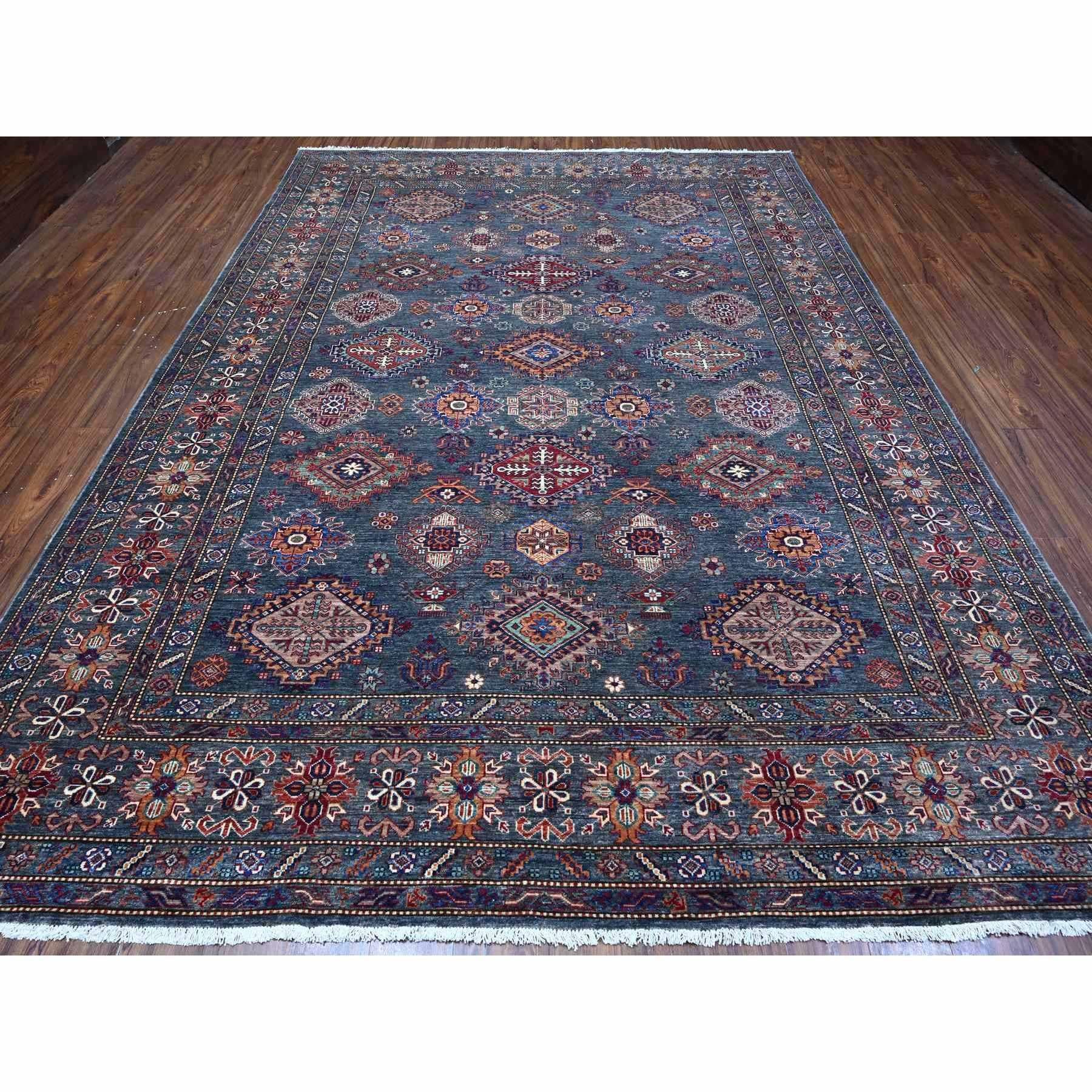 This is a truly genuine one-of-a-kind Afghan Super Kazak, Hand Knotted, Pure Wool, Oriental Rug. It has been Knotted for months and months in the centuries-old weaving craftsmanship techniques by expert artisans.
Primary materials: Wool
Latex: No