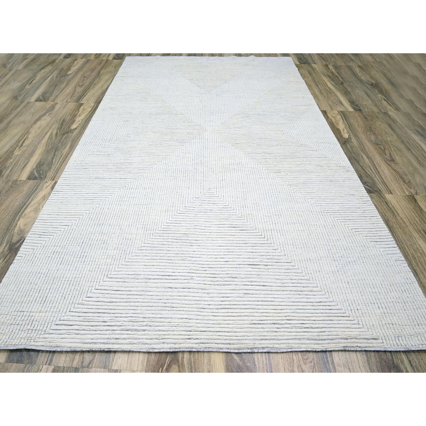 Alabaster White, Geometric Variegated Line Design, 100% Wool, Hand Knotted, Oriental Rug
Primary materials: Wool
Latex: No Pile 
height: 0.25 Inches
Style: Contemporary
Primary color: Ivory
Secondary colors: None
Pattern: Oriental