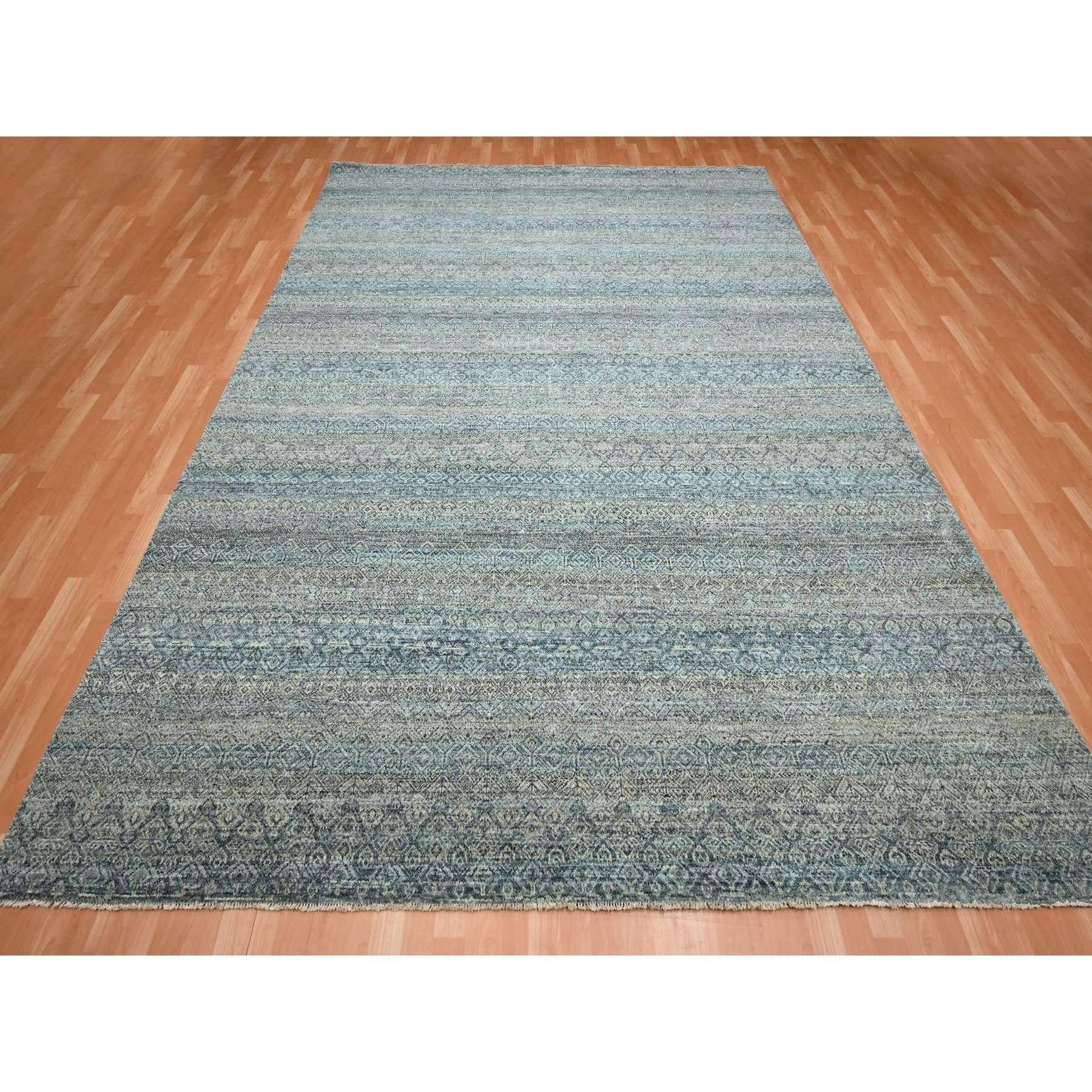 Marengo gris et bleu, motif Kohinoor Herat, petit motif géométrique répétitif en forme de diamant, laine douce et brillante, noué à la main, tapis oriental
Matières premières : Laine
Latex : Pas de poils 
hauteur : 0,25 pouces
Style :