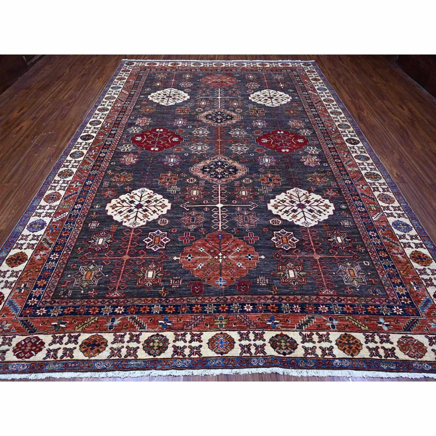 This is a truly genuine one-of-a-kind Afghan Super Kazak, Hand Knotted, Pure Wool, Oriental Rug. It has been Knotted for months and months in the centuries-old weaving craftsmanship techniques by expert artisans.
Primary materials: Wool
Latex: No