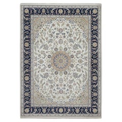 Tappeto in lana e seta annodato a mano 9
x12
3" avorio Nain con disegno di medaglioni floreali