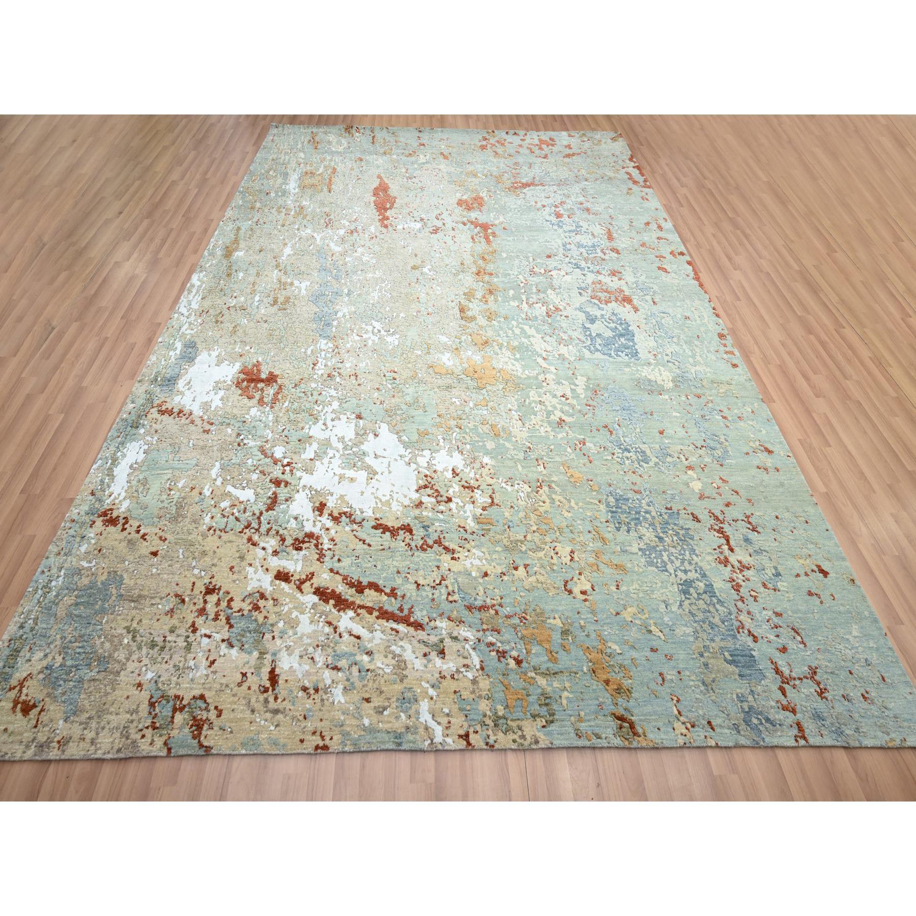 Pistaziengrün mit Beige, Persisch geknüpft, Abstrakt mit Galaxie Design, Reine Wolle, Handgeknüpft, Dicht gewebt, Orientteppich
Primäre MATERIALIEN: Wolle
Latex: Kein Flor 
Höhe: 0,25 Zoll
Stil: AM Contemporary
Grundfarbe: Grün
Sekundäre Farben: