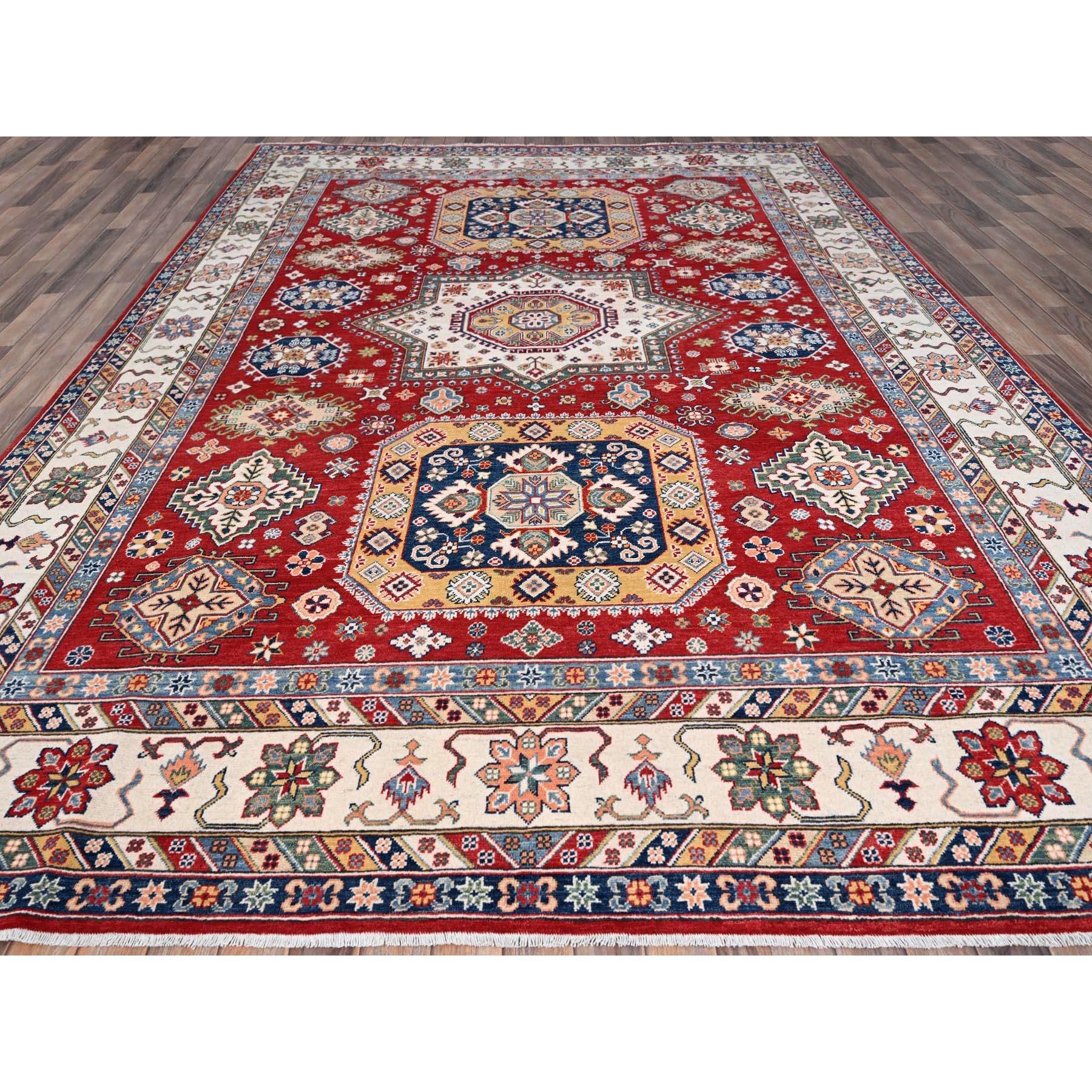 This is a truly genuine one-of-a-kind Kazak, Hand Knotted, Pure Wool, and Oriental Rug. It has been Knotted for months and months in the centuries-old weaving craftsmanship techniques by expert artisans.
Primary materials: Wool
Latex: No Pile