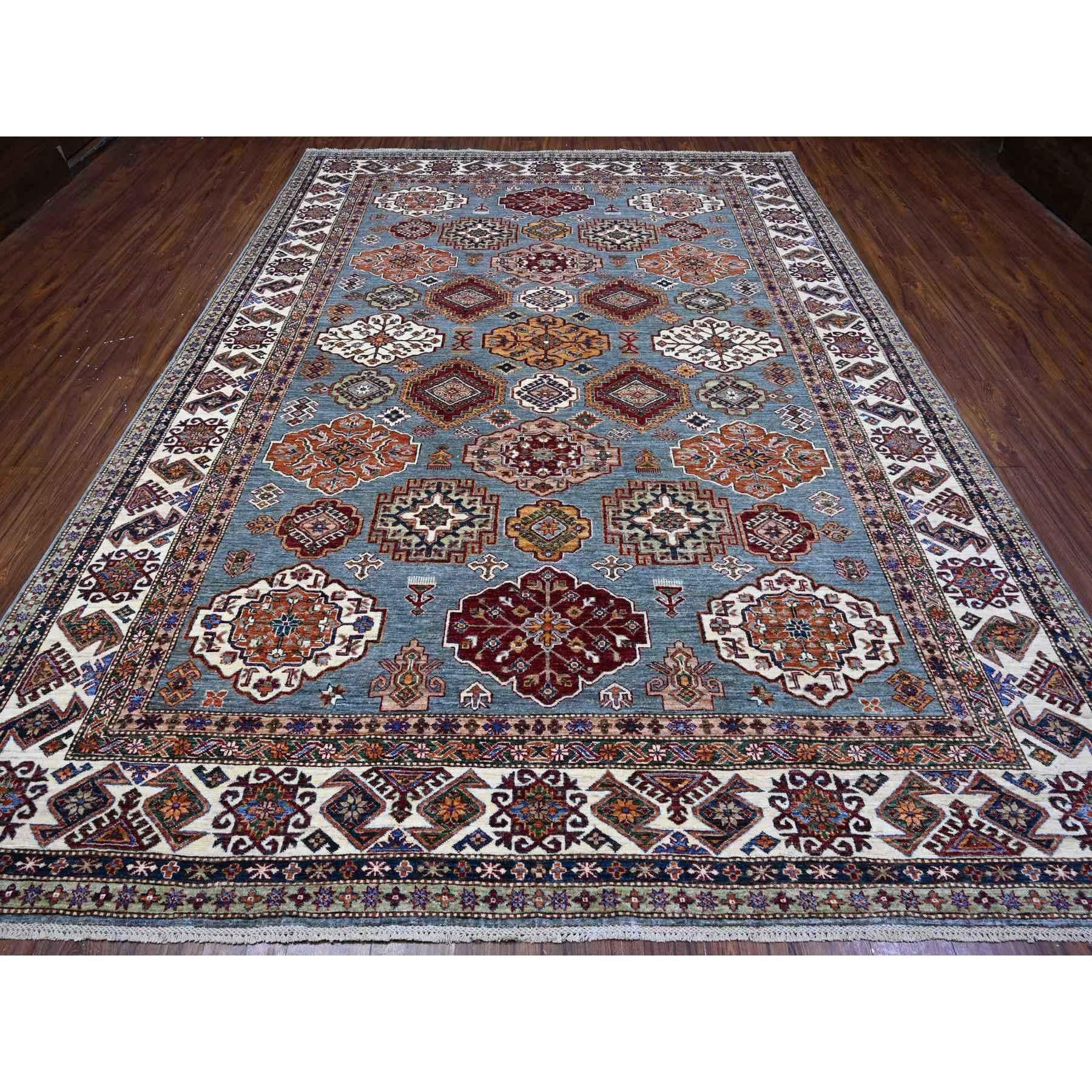 This is a truly genuine one-of-a-kind Afghan Super Kazak, Hand Knotted, Pure Wool, Oriental Rug. It has been Knotted for months and months in the centuries-old weaving craftsmanship techniques by expert artisans.
Primary materials: Wool
Latex: No