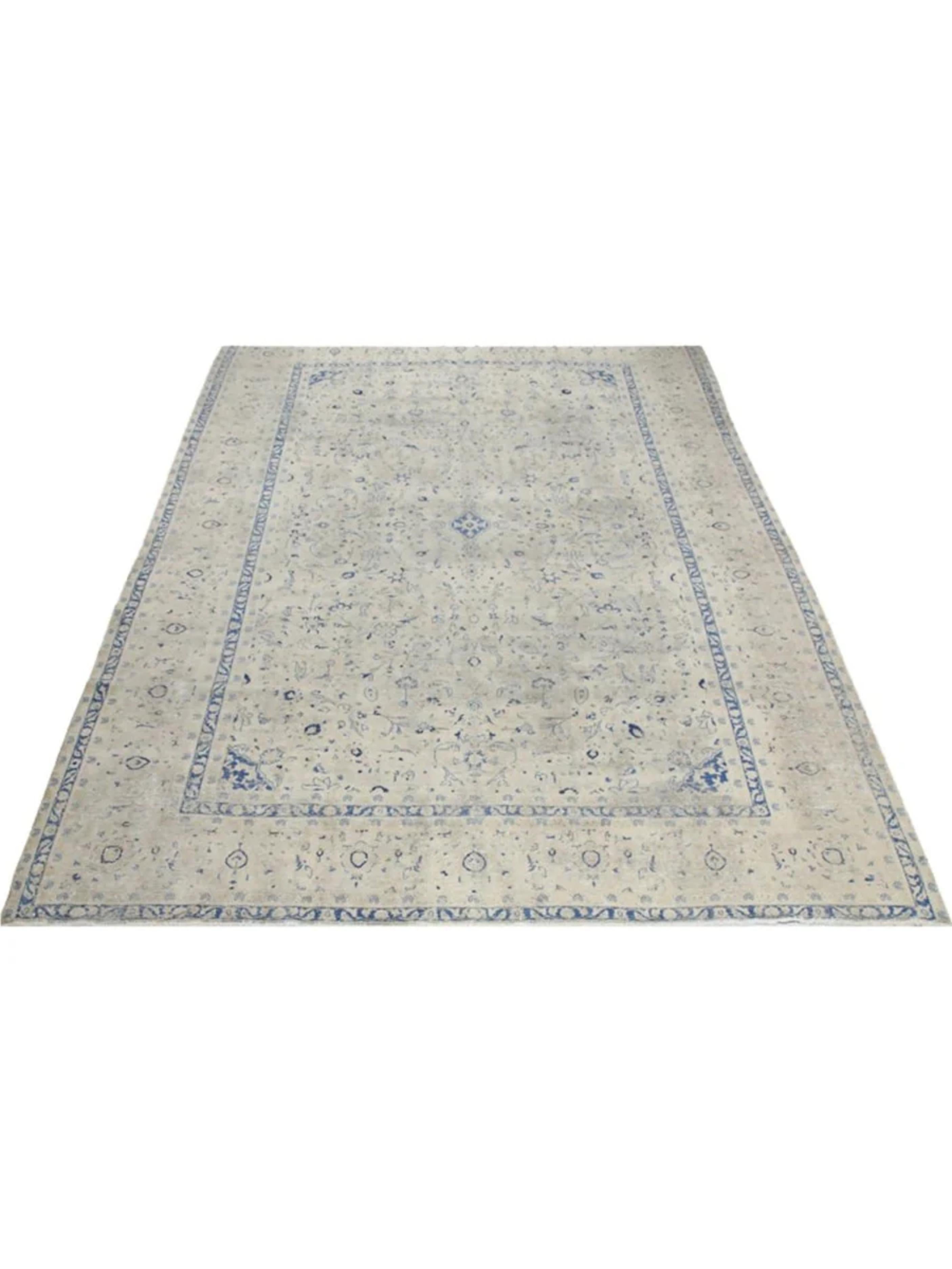 Elevate your living space  with the 9x13 Vintage Distressed Patchwork Area Rug, a truly one-of-a-kind creation that seamlessly combines timeless craftsmanship with modern design. Hand-knotted from premium wool, this rug features a captivating