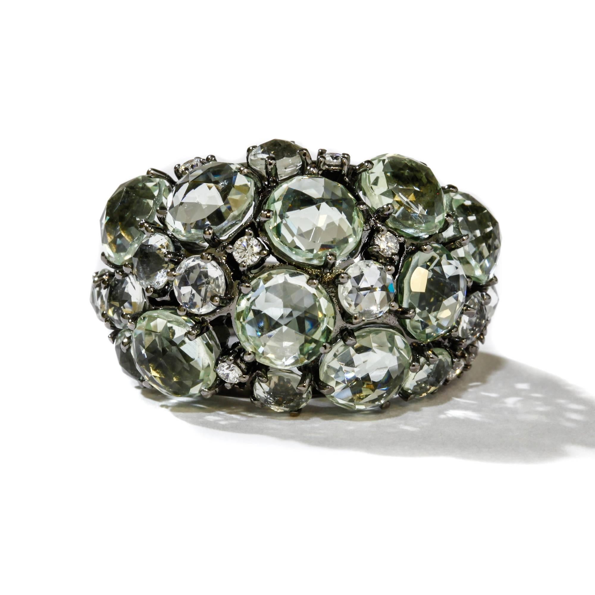 This A & Furst dome ring features 15.00 ct. of rose cut prasiolites (green quartz) and 0.22 ct. round diamonds set in 18k black gold. It is a size 7.5. Light scratches on outside bottom of shank (see photos). A & Furst jewelry is designed in Napa