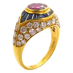 1.10 Carat Ruby, Blue Sapphire Baguette and Diamond Ring in 18 Karat Gold