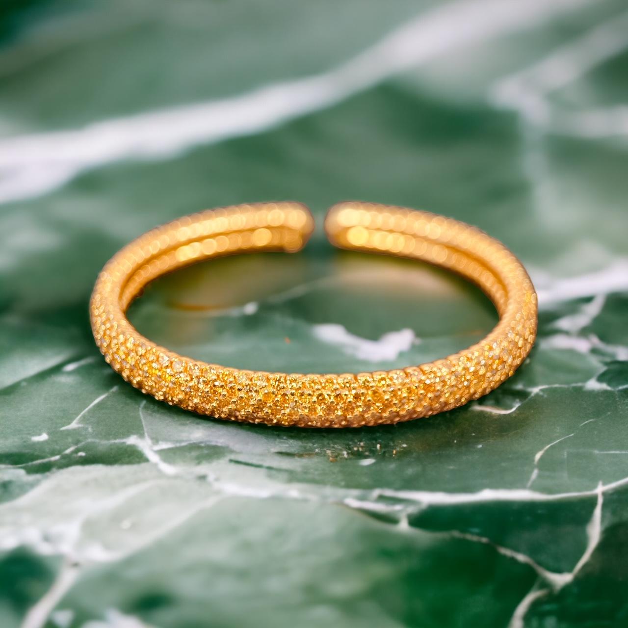 A 12 Carats Pave' Set Fancy Yellow Diamond Bangle, 9mm Width In Excellent Condition For Sale In London, GB