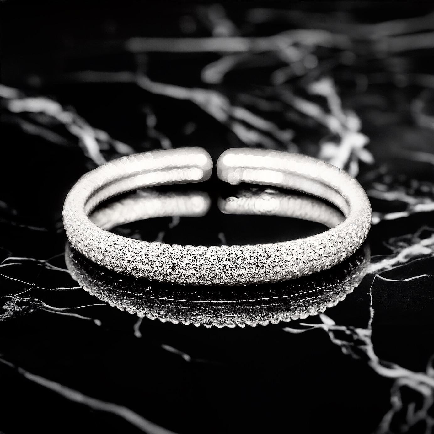 A 12 Carats Pave' Set Fancy White Diamond Bangle, 9mm Width In Excellent Condition For Sale In London, GB