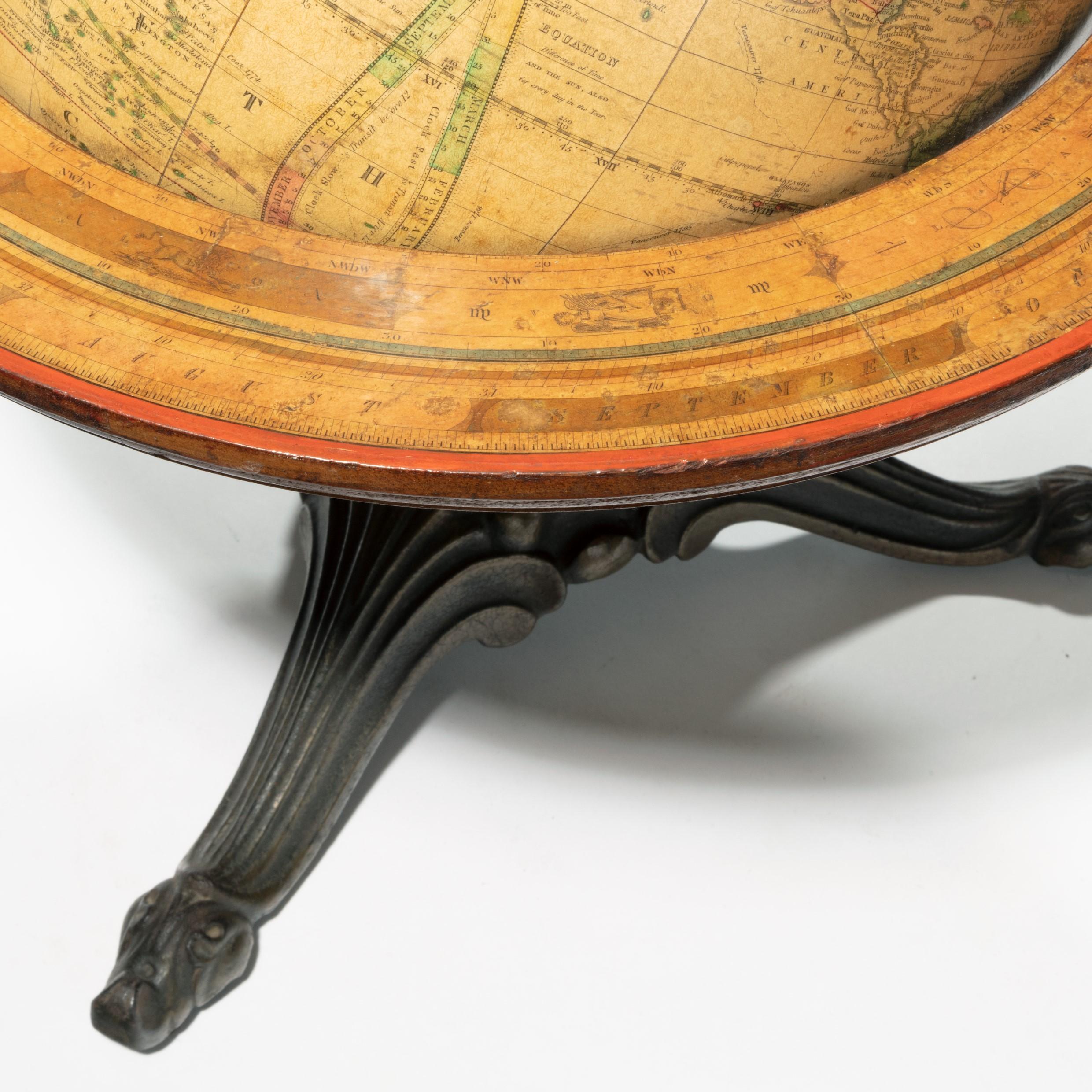 A 12 inch Franklin terrestrial table globe by Nims & Co, New York, the twelve gores engraved and hand-coloured, with a brass calibrated meridian ring and papered horizon ring, all raised on a tripod cast iron base, the cartouche reading “The