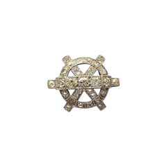 A 14 Carat White Gold Diamond Steering Wheel Ring