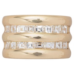 A 14 Carat Yellow Gold Wide Band Ring with Carré Cut Diamonds