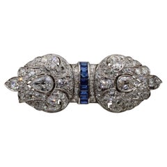 A 14.40 Carat Art Deco Platinum Old-Miner & Old European Double Filigree Brooch