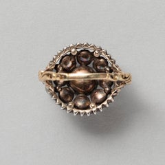 A 14k Gold and SIlver Ring set with Rose Cut Diamonds