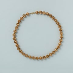 A 14k Gold Open Worked Bead Necklace