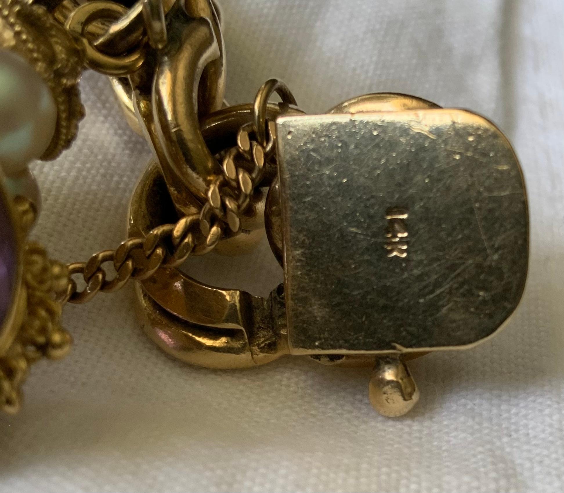 A 14K Solid Gold Charm Double Link Bracelet In Good Condition For Sale In Guaynabo, PR