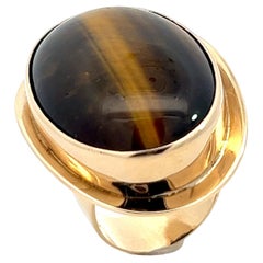 A 14k yellow gold and Tiger's Eye Quartz ring by Paul Erik Jensen