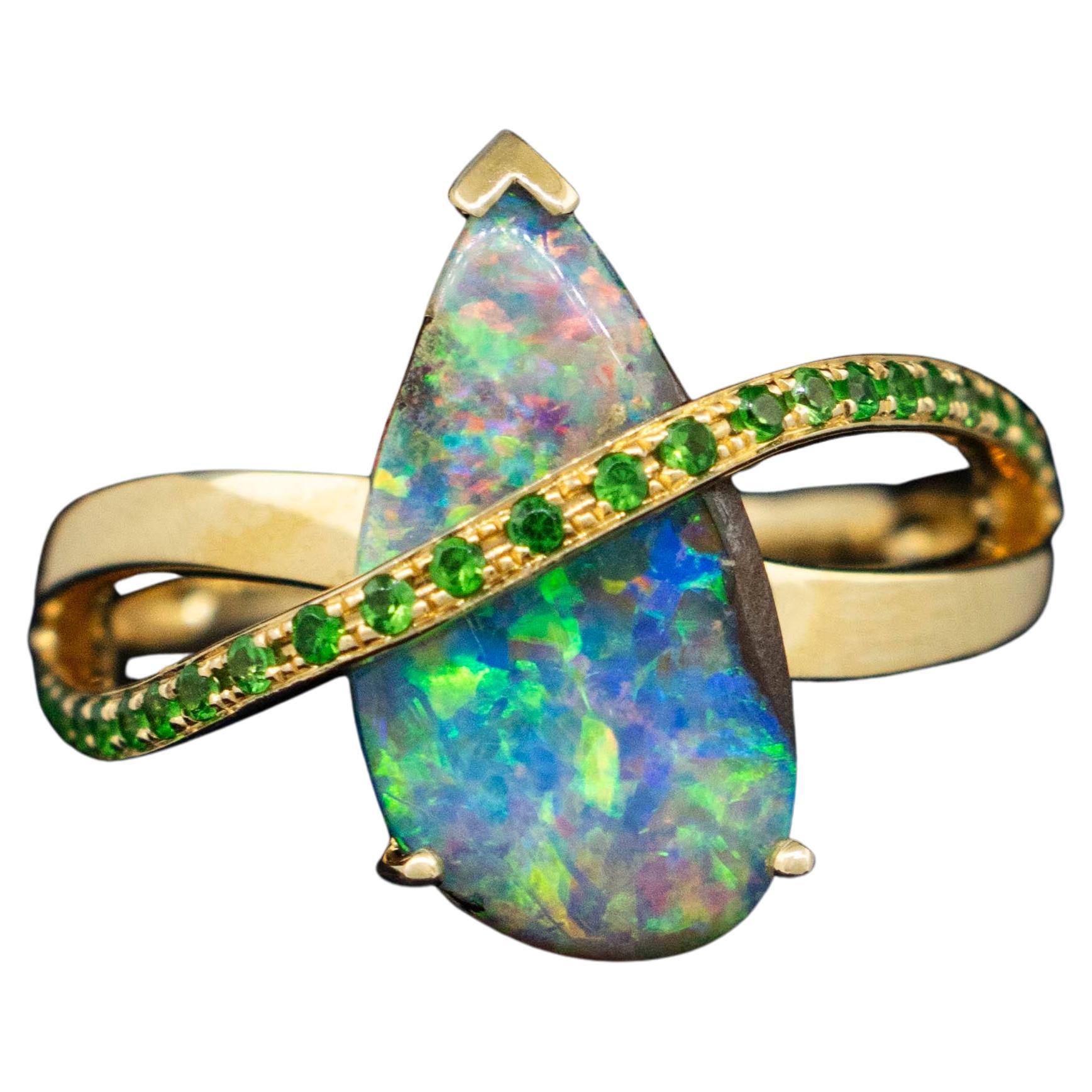 A 14K Yellow Gold Black Opal and Tsavorite Ring