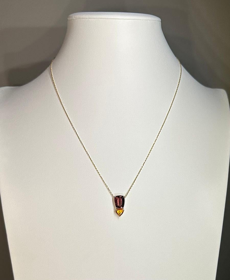 A 14kt Yellow Gold Pendant with Sapphires For Sale 6