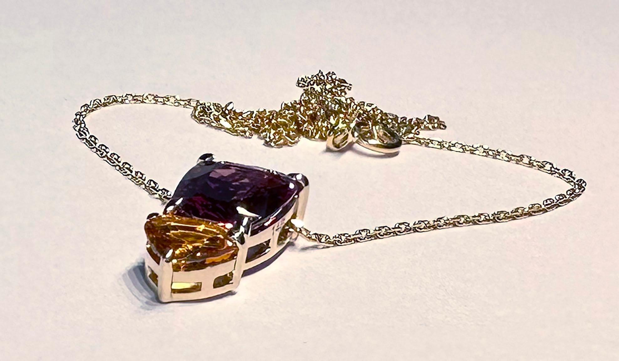 A 14kt Yellow Gold Pendant with Sapphires For Sale 10