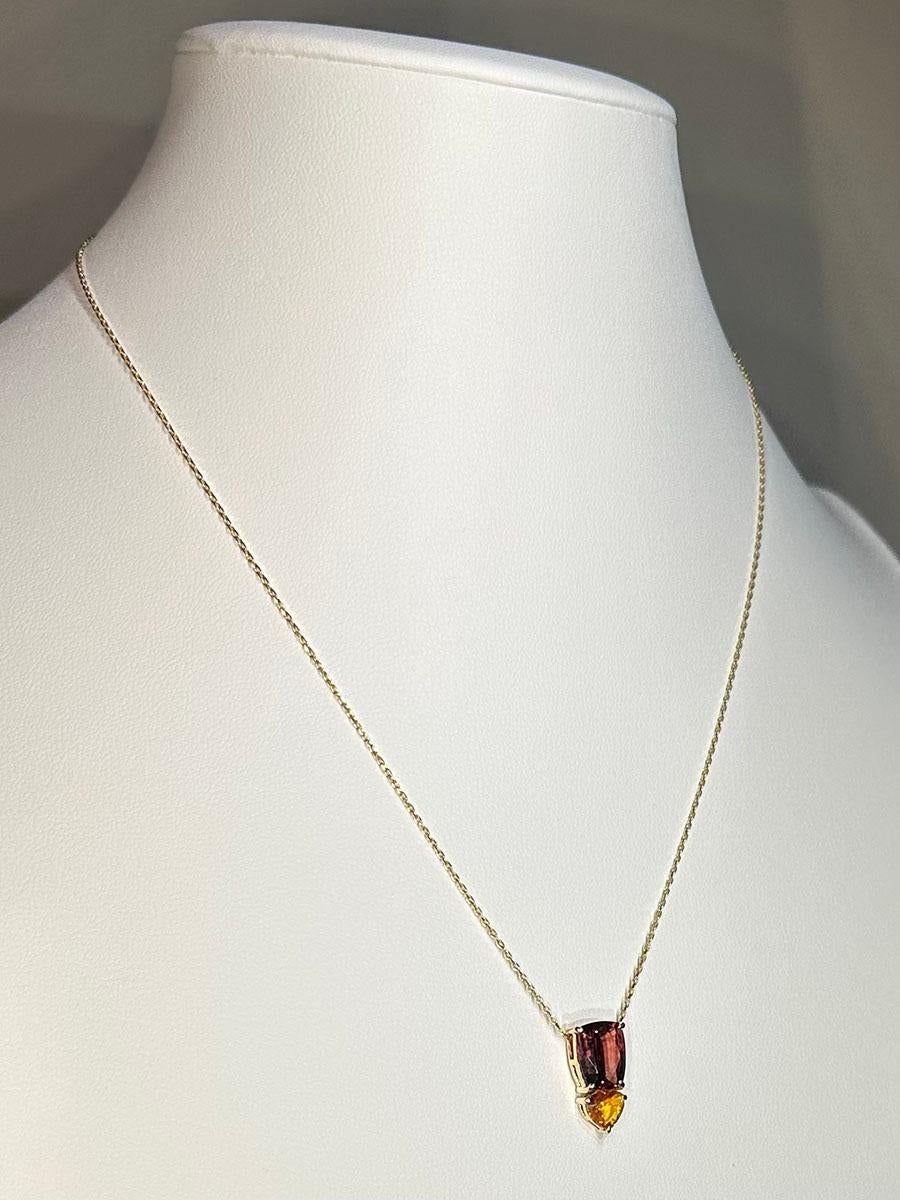 A 14kt Yellow Gold Pendant with Sapphires For Sale 11