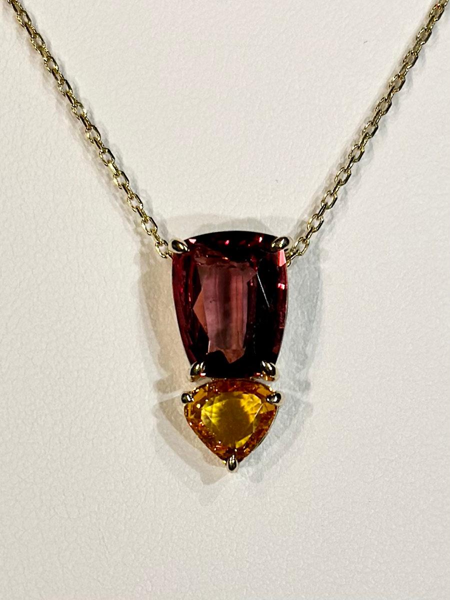 Trillion Cut A 14kt Yellow Gold Pendant with Sapphires For Sale