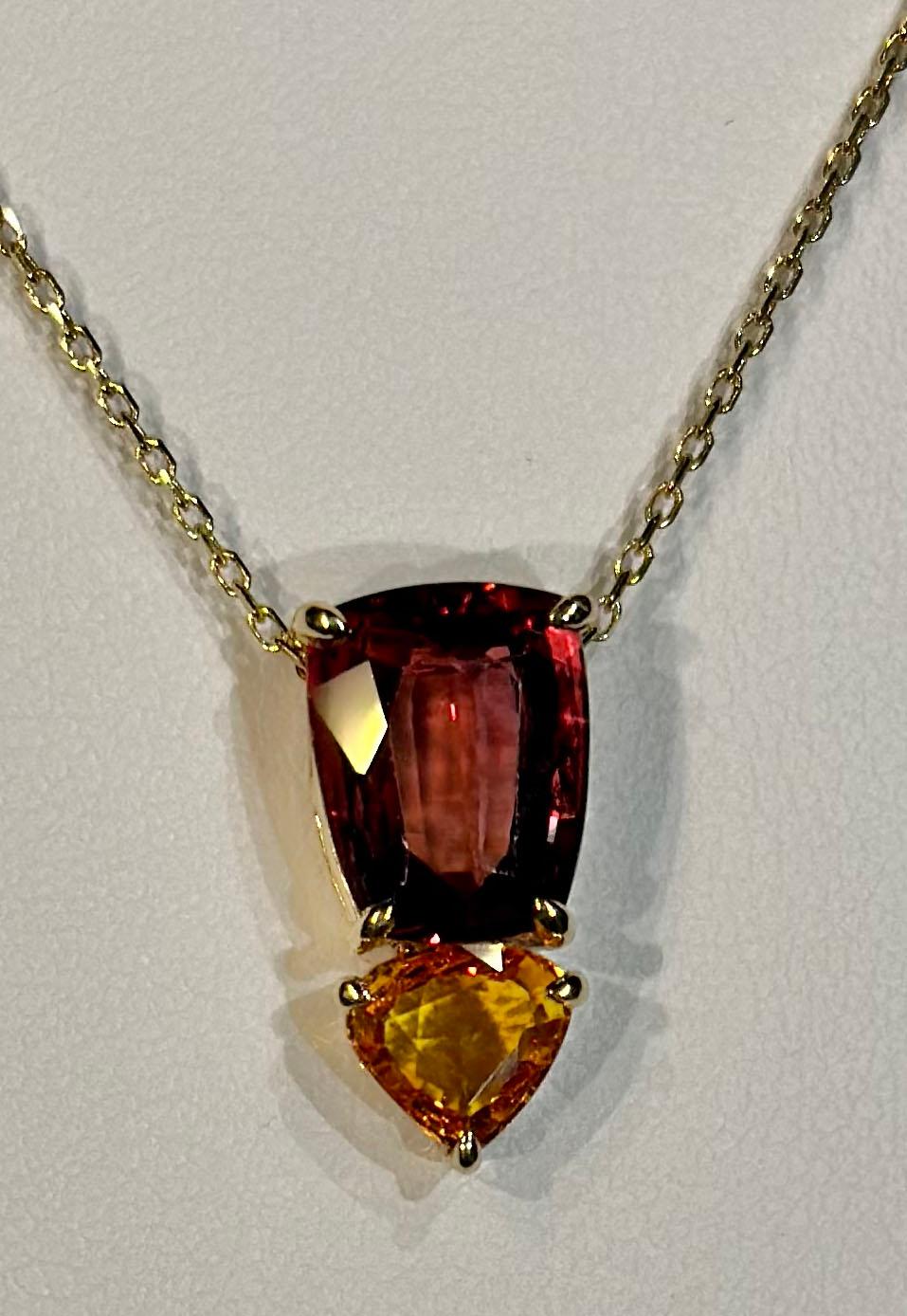 A 14kt Yellow Gold Pendant with Sapphires For Sale 1