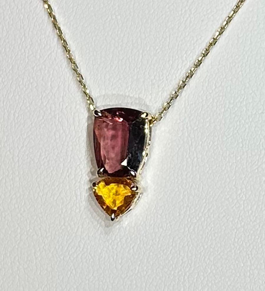A 14kt Yellow Gold Pendant with Sapphires For Sale 3
