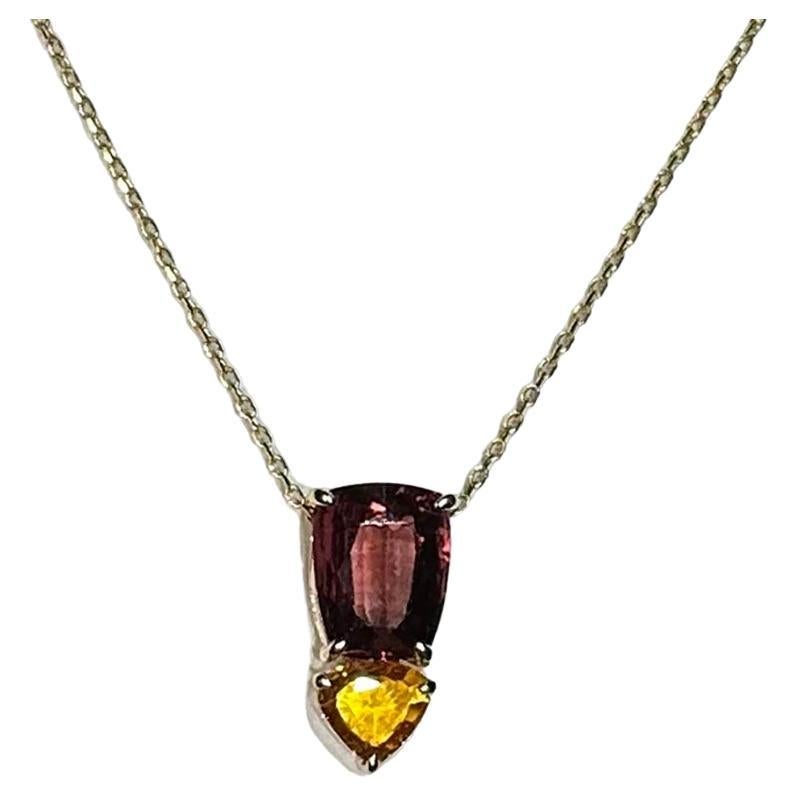 A 14kt Yellow Gold Pendant with Sapphires For Sale