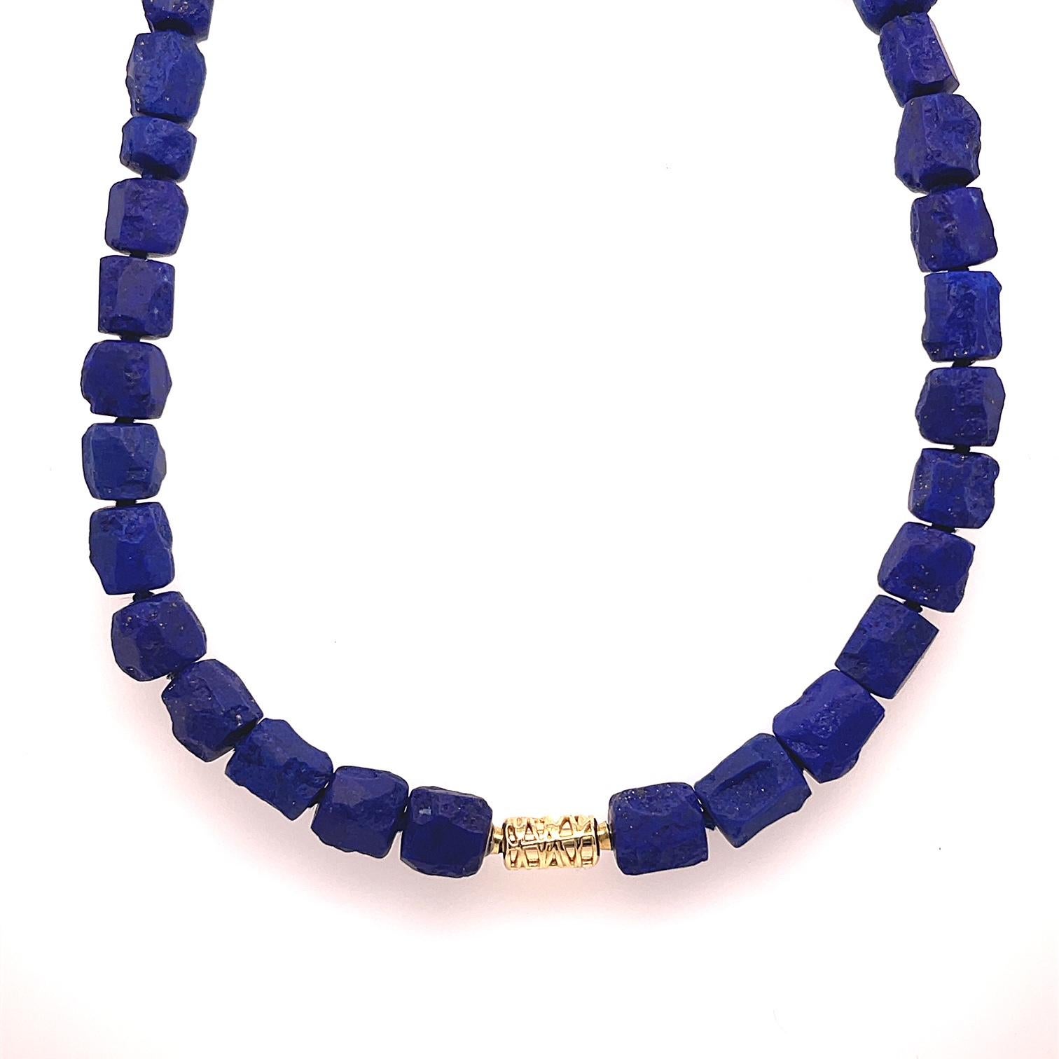 A 156 carat lapis lazuli nugget necklace, untreated from Afghanistan necklace with 18k yellow gold modullyn nittle parts, with a sterling silver clasp bezel set with a piece of Steve Walters onyx/ tourmaline/ hemetite/ 18k yellow gold/ peridot/