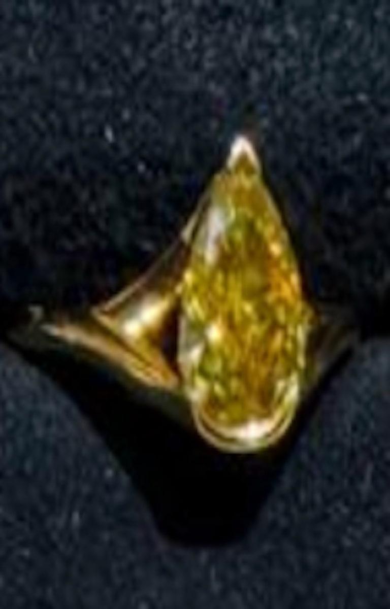Pear Cut A 1.59 ct Pear Shape Fancy Deep Brown Yellow Diamond Ring For Sale