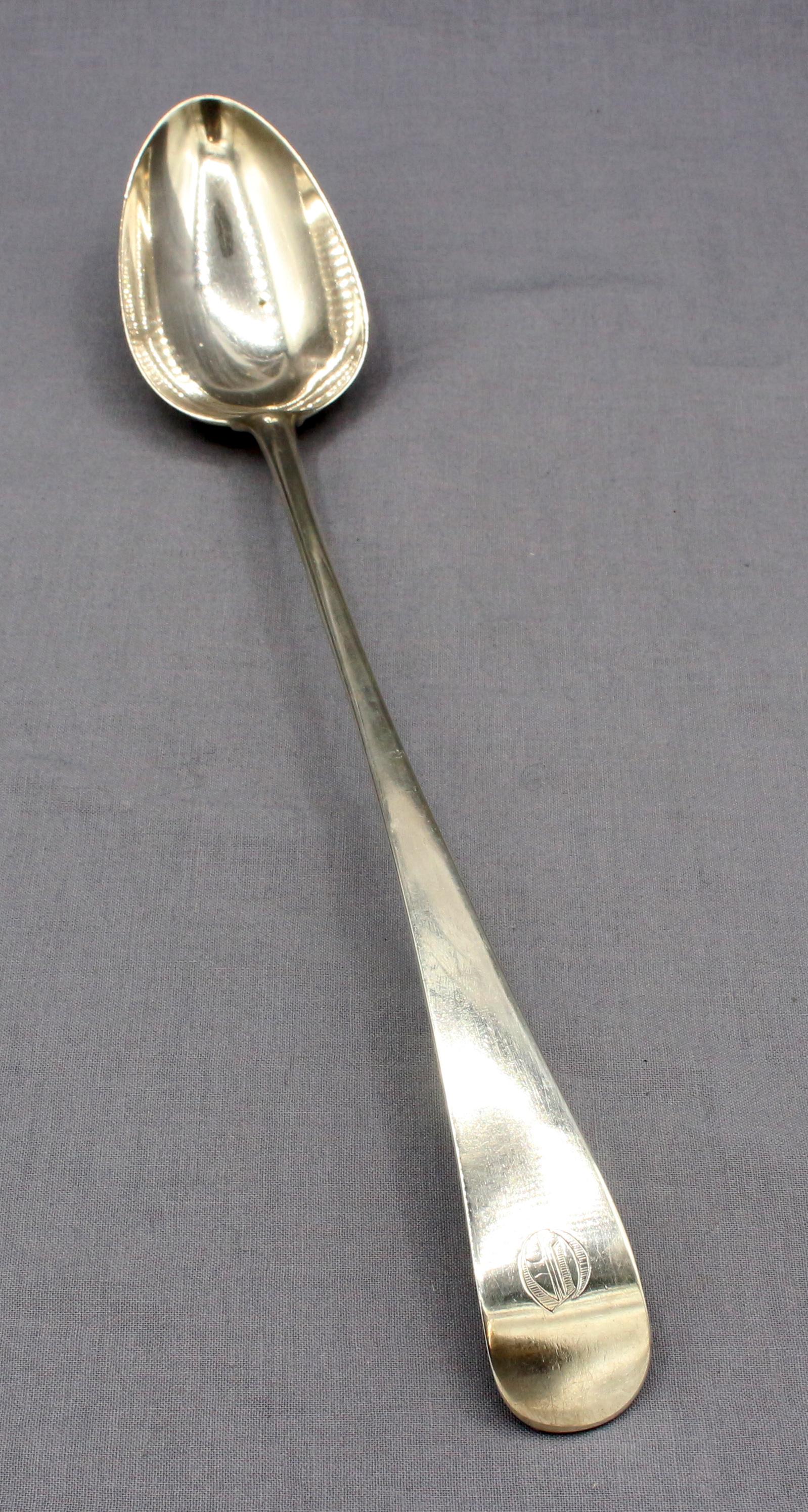 A 1790 sterling basting spoon, London, Old English pattern by Thomas Liddiard(?). 