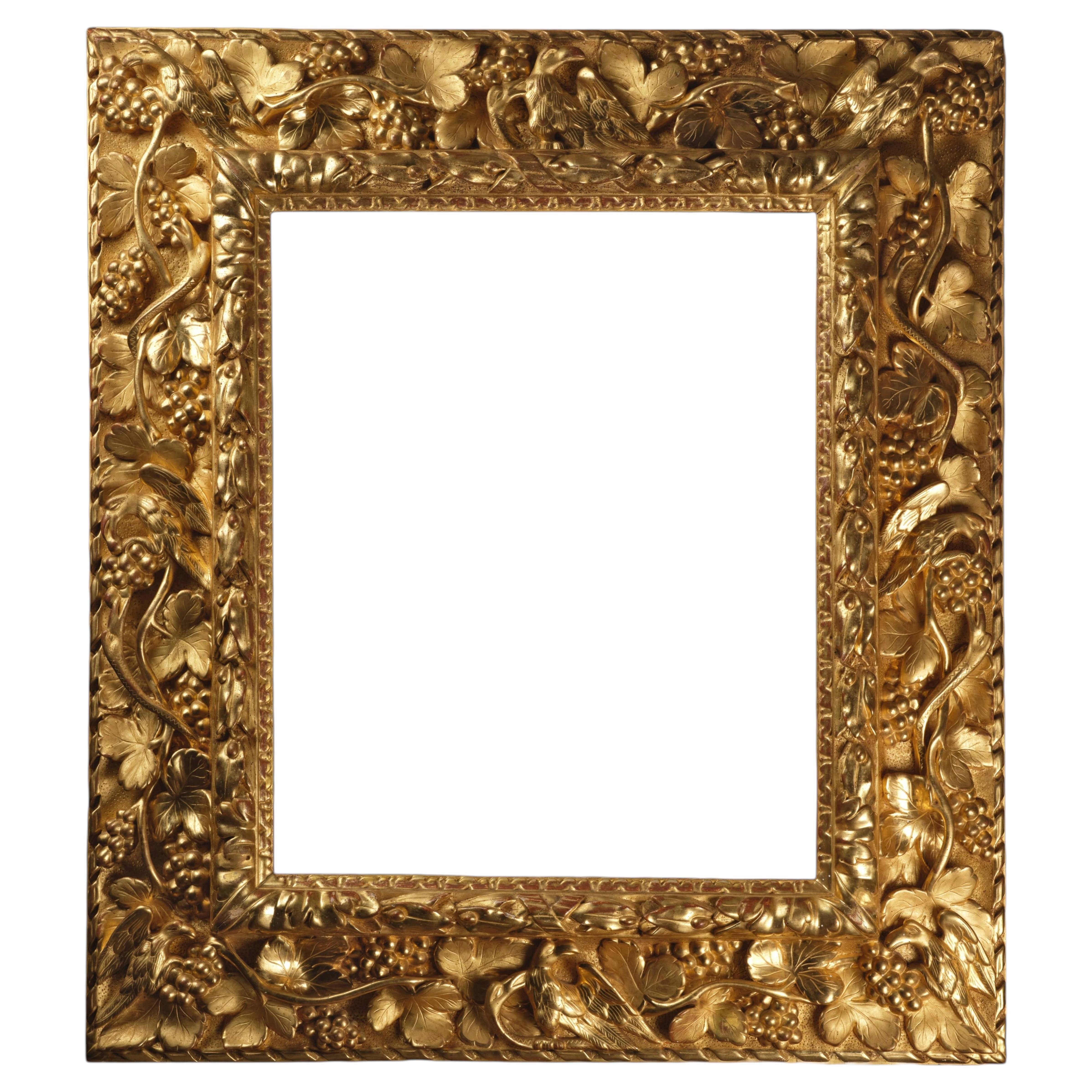 A 17th century fine French carved and giltwood frame with rich grapevine carving For Sale