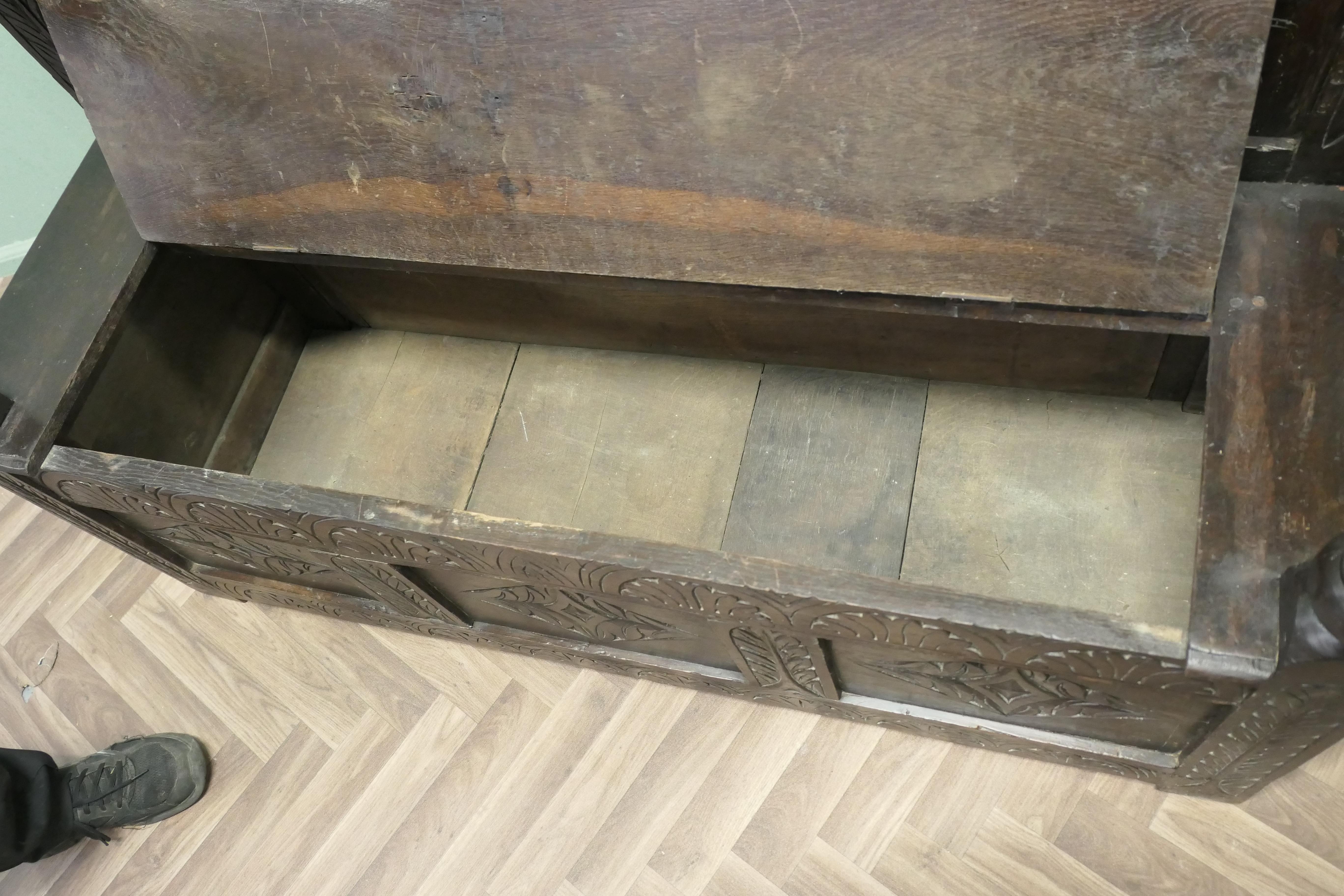 A 17th Century High Back Oak Box Settle   The Settle has 3 carved back panels in vendita 1