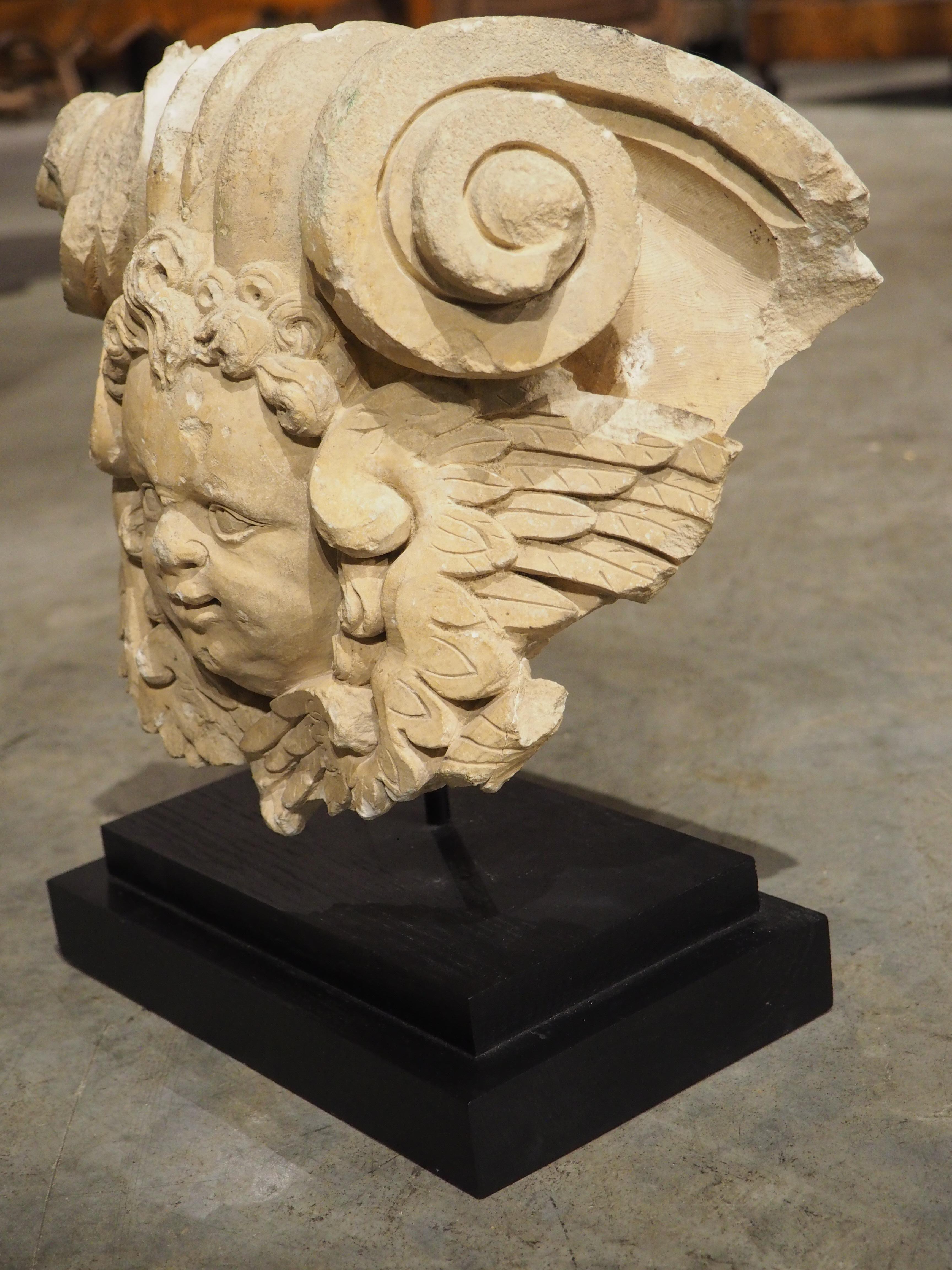 Hand-Carved A 17th Century Mounted French Limestone Carving of a Winged Angel For Sale