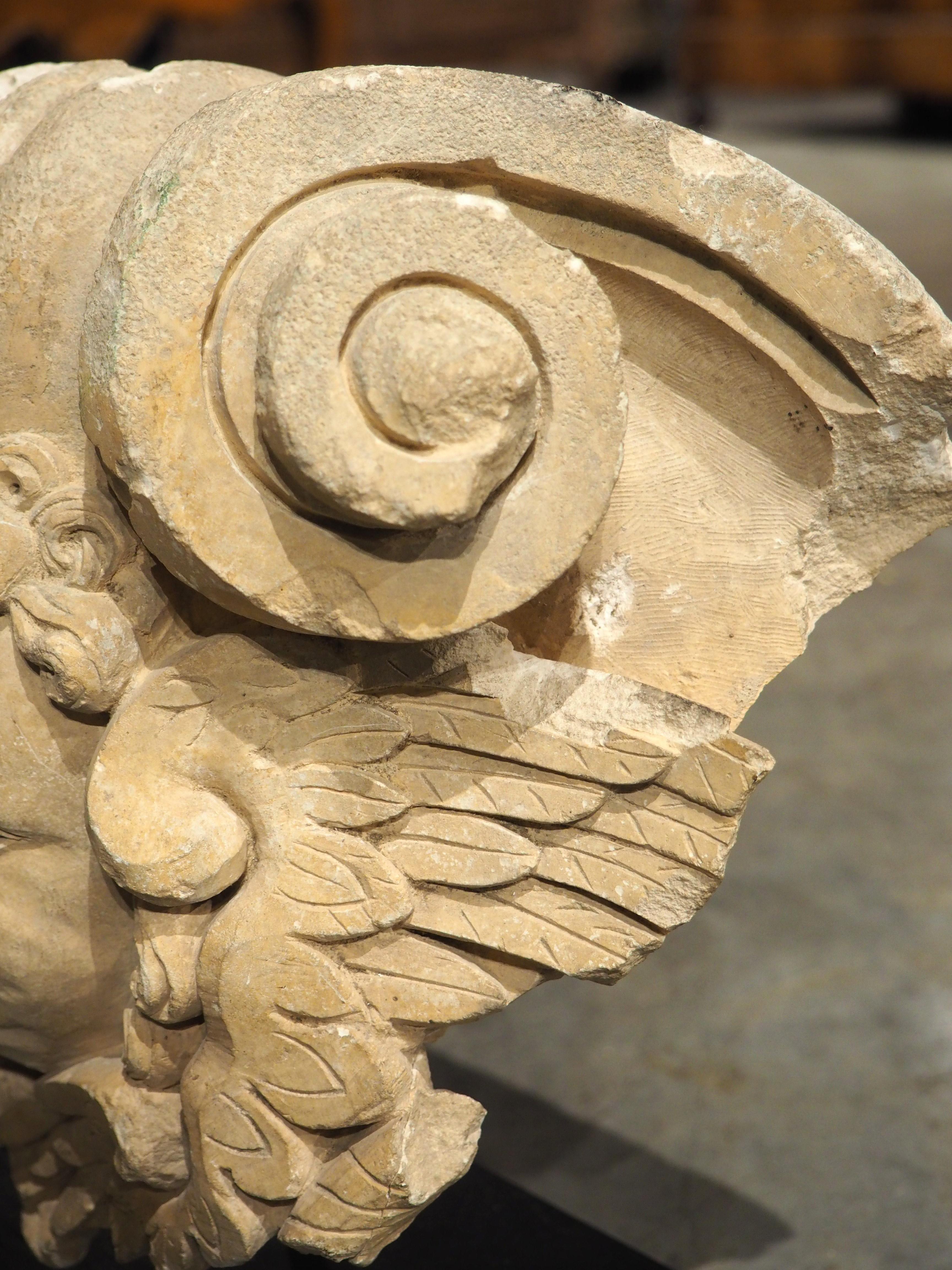 A 17th Century Mounted French Limestone Carving of a Winged Angel In Good Condition For Sale In Dallas, TX