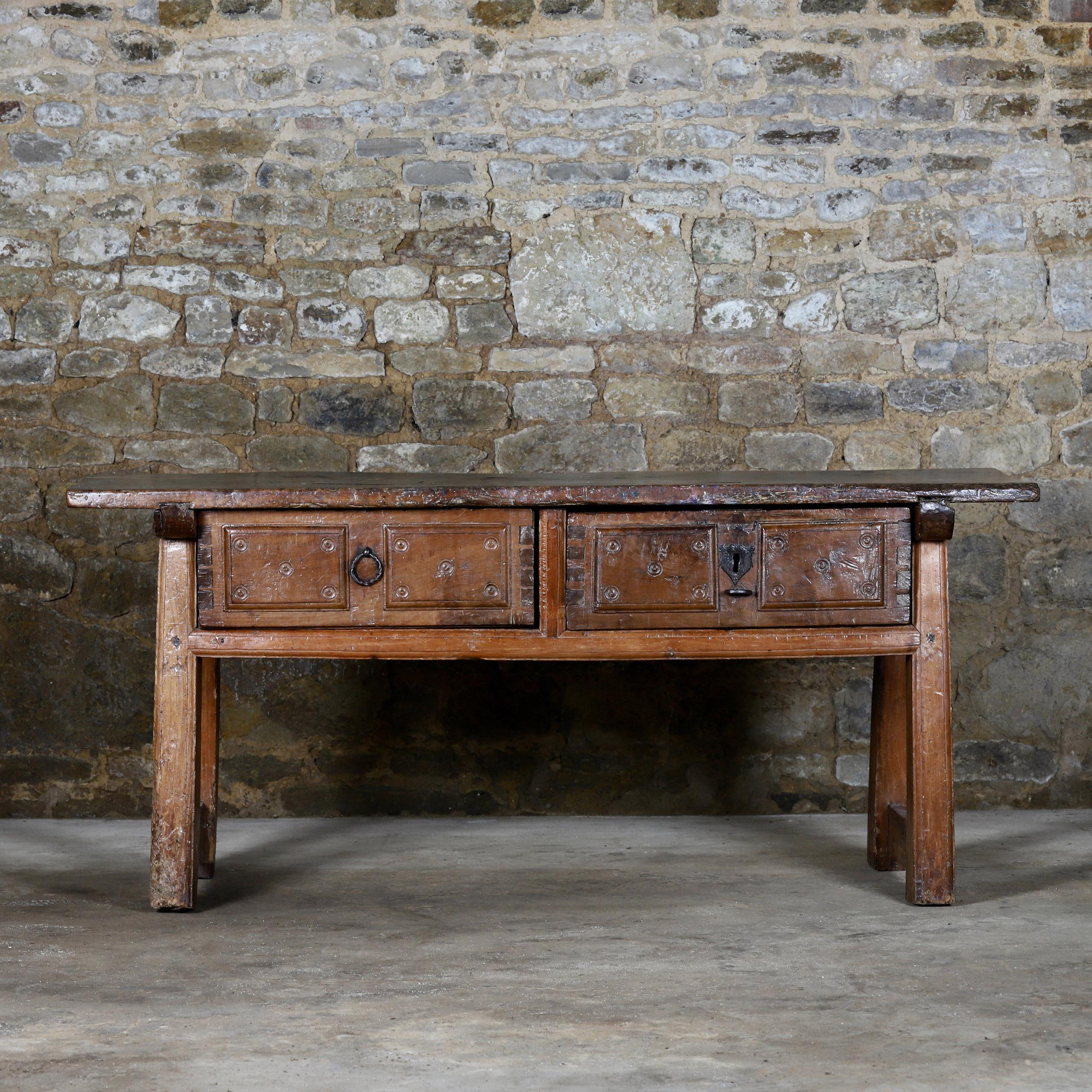 Vagabond Antiques presents a 17th century Spanish table.

Spain, late 17th Century

”Early Spanish table in solid chestnut, the single plank top is original and heavily patinated, bold and primitive in style “

Provenance:

Haseley Court,