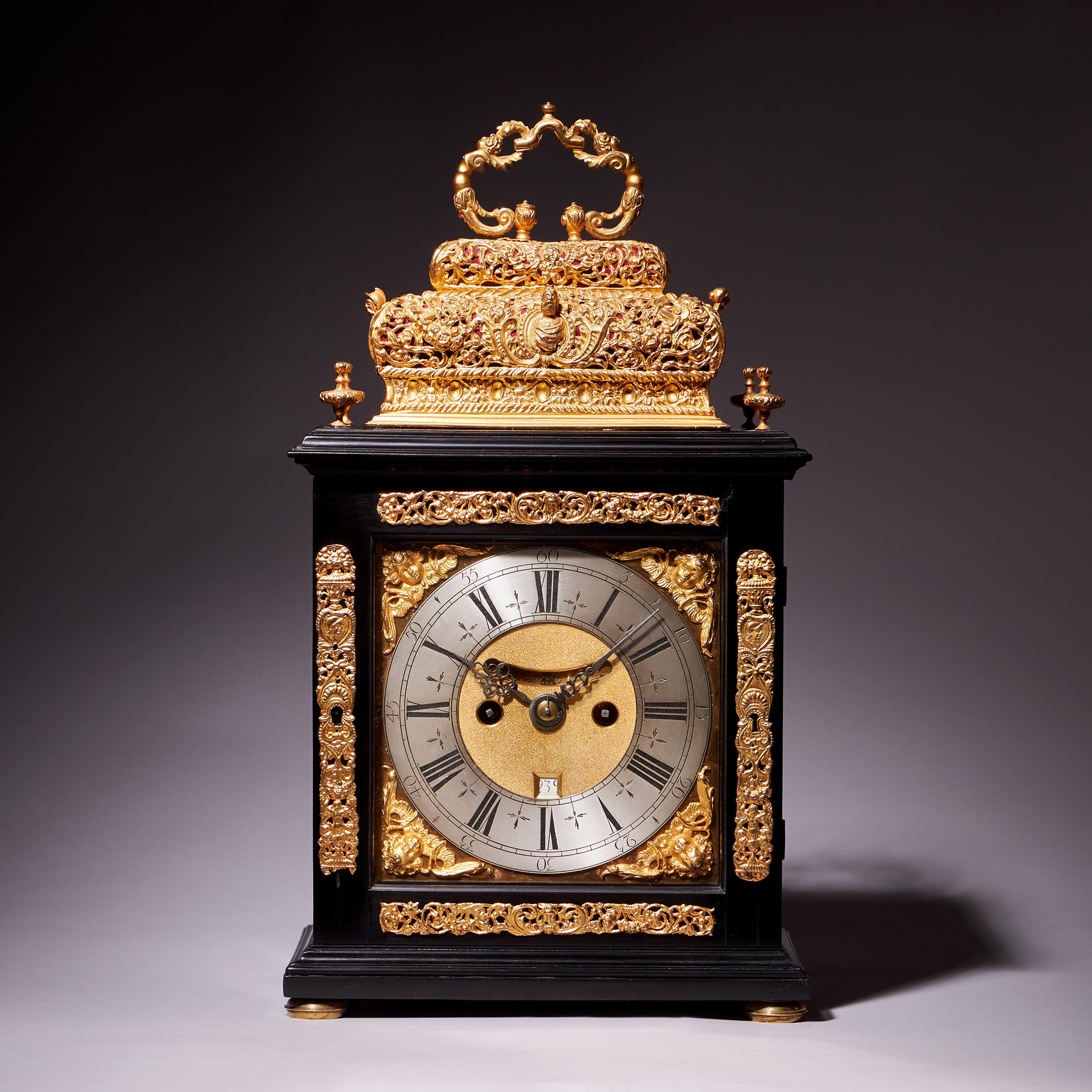 A relatively small and extremely attractive late 17th century English eight-day spring-driven double basket table clock signed on the backplate Asselin London, dating to the period c.1695-1700.  

The elegantly proportioned ebony-veneered double