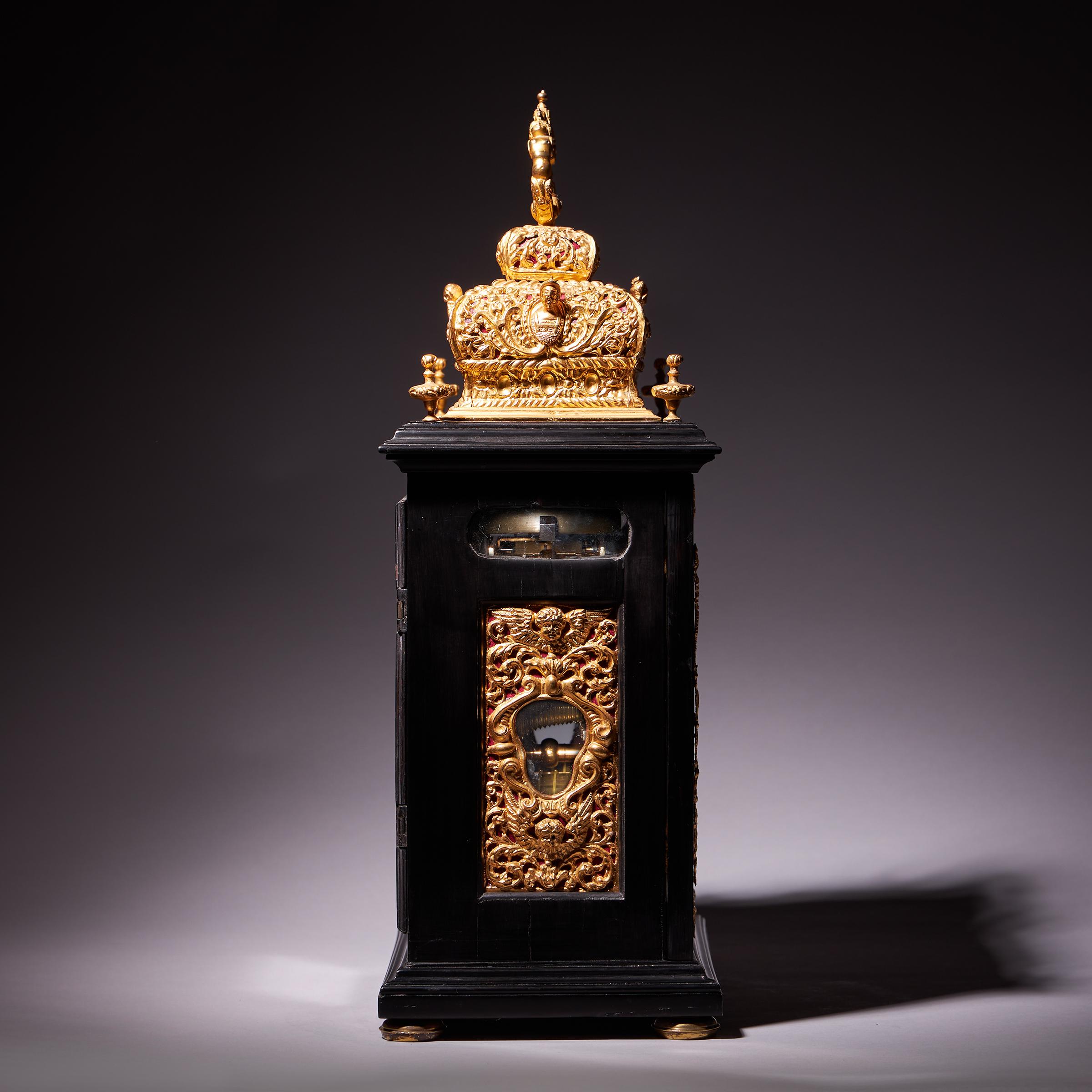 Brass A 17th Century William and Mary eight-day double basket table clock by Asselin For Sale