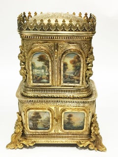 18th Century miniature bronze gilt cabinet with underglass paintings