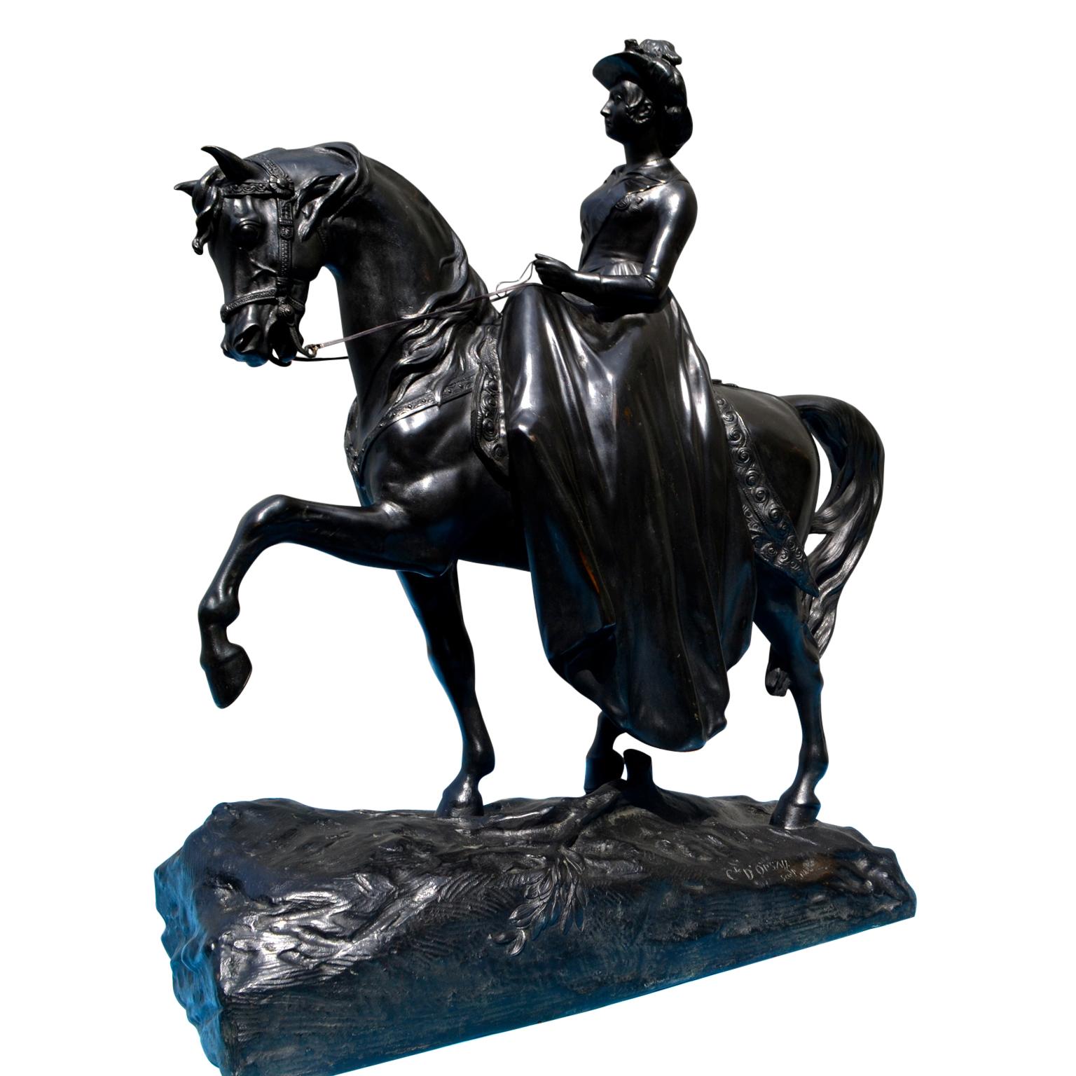 A rare beautifully cast equestrian bronze statue by a French noble Alfred-Guillaume-Gabriel, Count d’Orsay of her Majesty a young Queen Victoria riding side saddle on a prancing Arab Stallion; mounted upon a base of naturalistic form; signed Cte