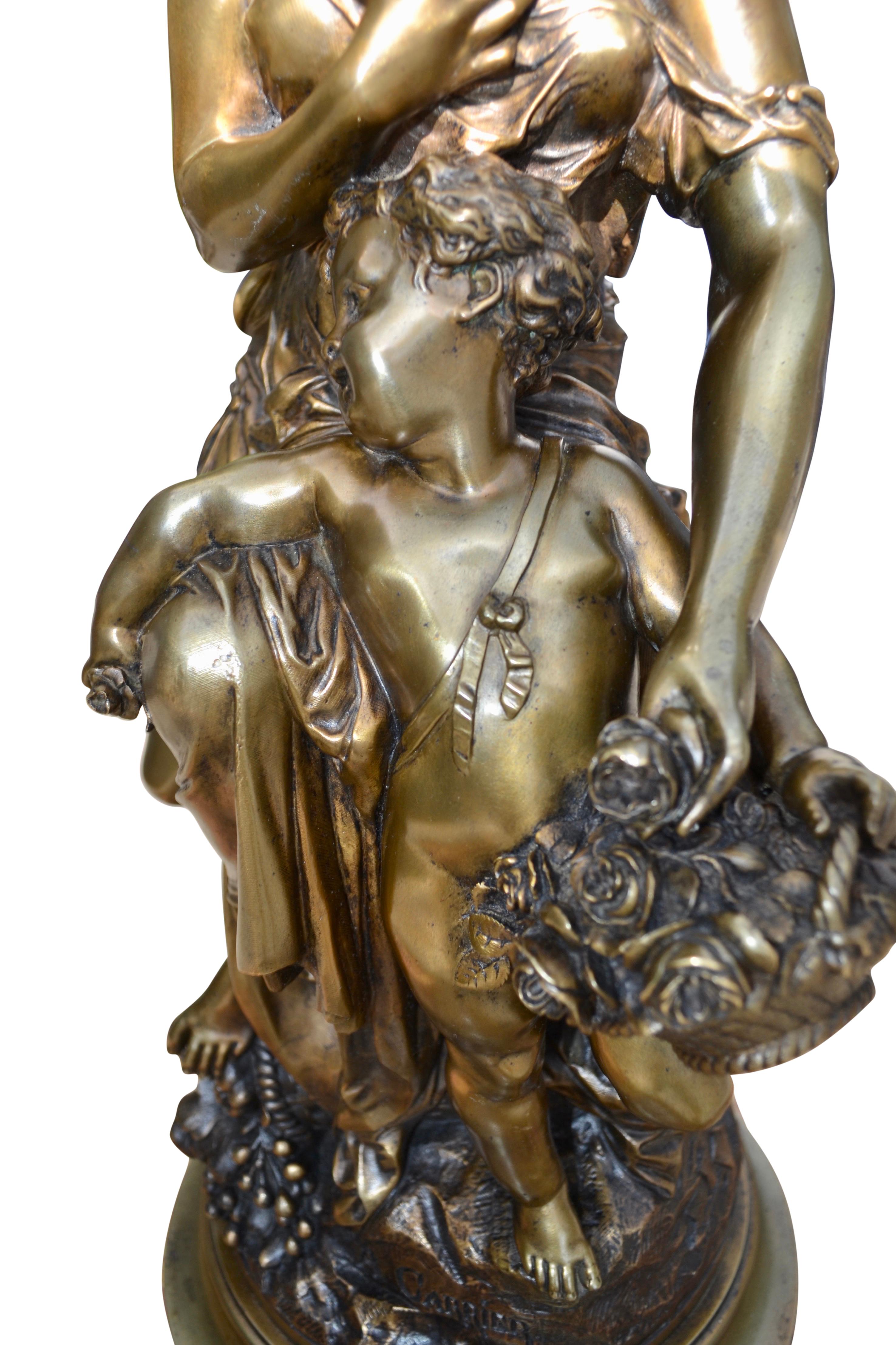 A 19 Century French  Gilt bronze Statue of Venus and Cupid  signed A. Carrier  1