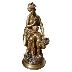  A 19 Century French  Gilt bronze Statue of Venus and Cupid  signed A. Carrier 