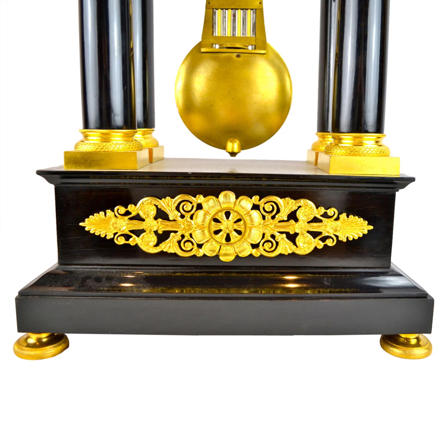 19th Century French Louis Philippe Ebonized Wood and Gilt Bronze Portico Clock For Sale 2